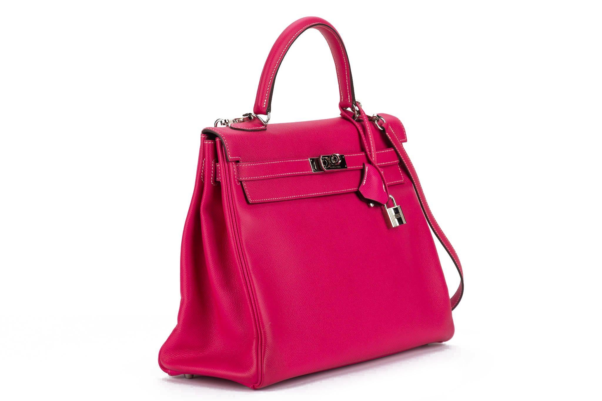 Hermès limited edition candy Kelly 35 cm, retourne bag in rose tyrien epsom leather exterior /tosca chèvre misore interior and palladium hardware. Handle drop, 3.5