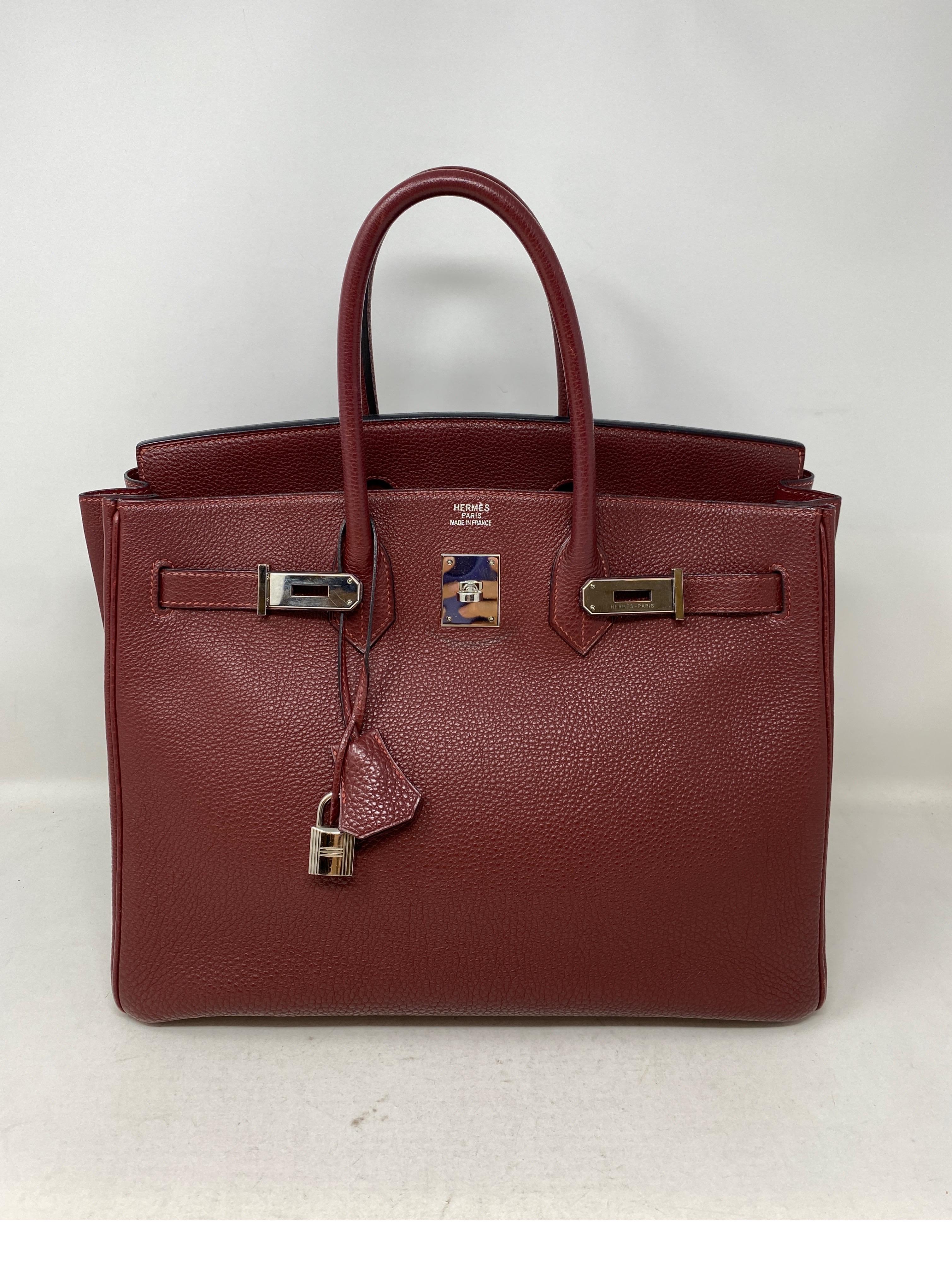 Hermes Rouge Birkin 35 Bag. Beautiful burgundy color with silver palladium hardware. Good condition. Nice neutral color. Includes clochette, lock, keys, and dust cover. Guaranteed authentic. 