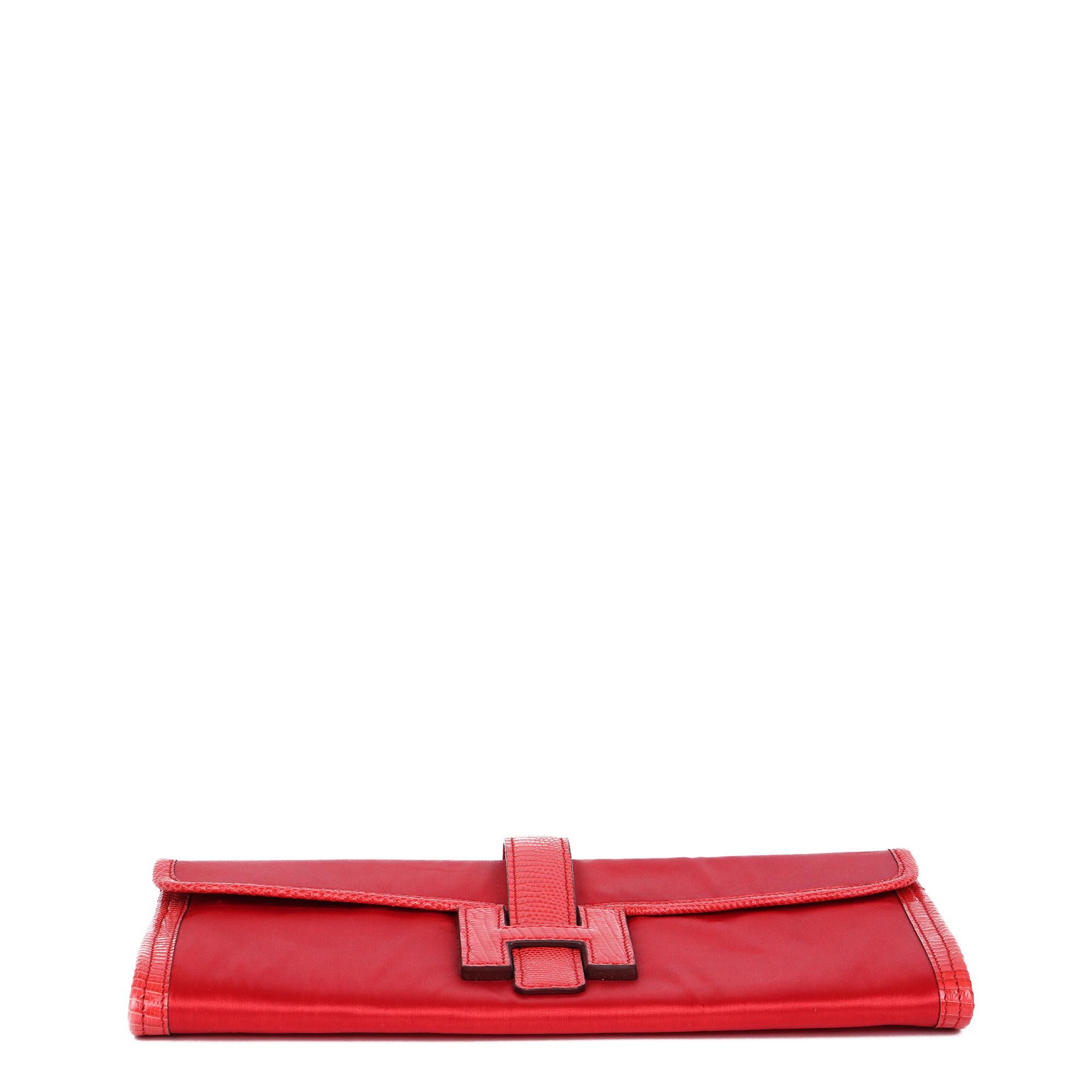 HERMÈS
Rouge Braise Lizard Leather & Silk Jige Elan 29

Serial Number: [O]
Age (Circa): 2011
Authenticity Details: Date Stamp (Made in France)
Gender: Ladies
Type: Clutch

Colour: Rouge Braise
Hardware: Silver
Material(s): Lizard Leather,