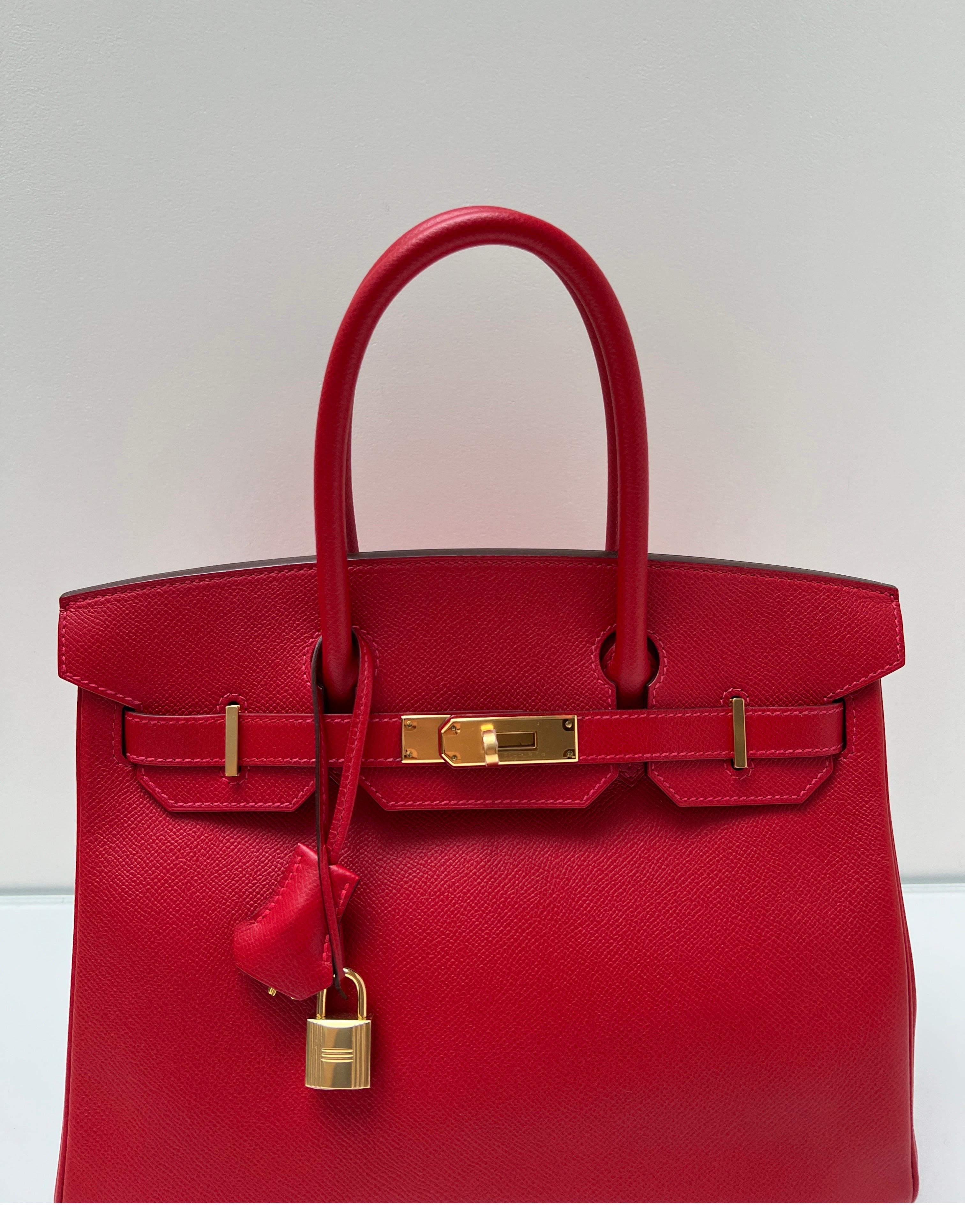 Hermes Rouge Casaque Birkin 30 Bag. Excellent looks like new condition. Stunning red bag with gold hardware. Plastic is on the hardware. Never used. Gift worthy. Interior clean. Exterior has no wear. Includes clochette, lock, keys, and dust bag. The