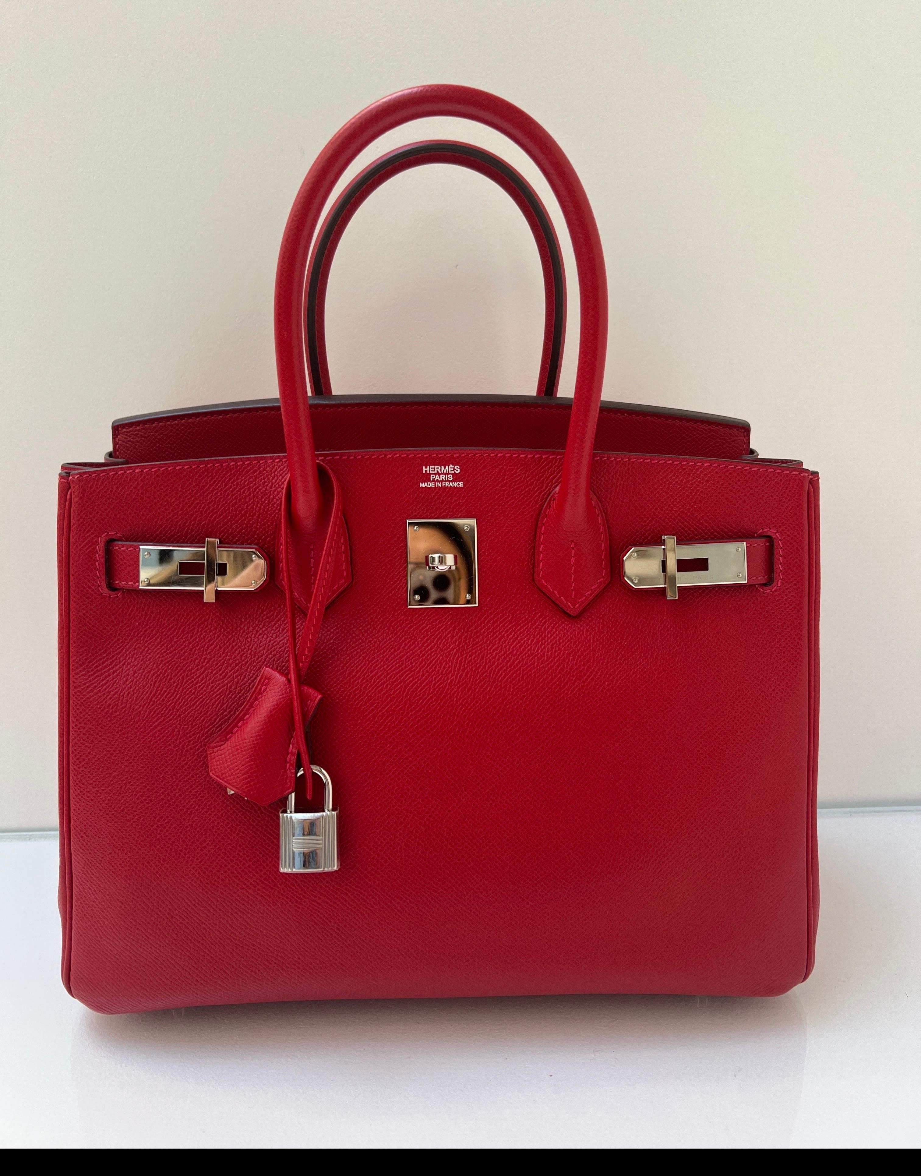 Hermes Rouge Casaque Birkin 30 Bag. Most wanted red color. Gorgeous bag with palladium hardware. Interior clean. Vibrant red. Epsom leather. Most wanted size and red is the color of the year. Includes clochette, lock, keys, and dust bag. Guaranteed