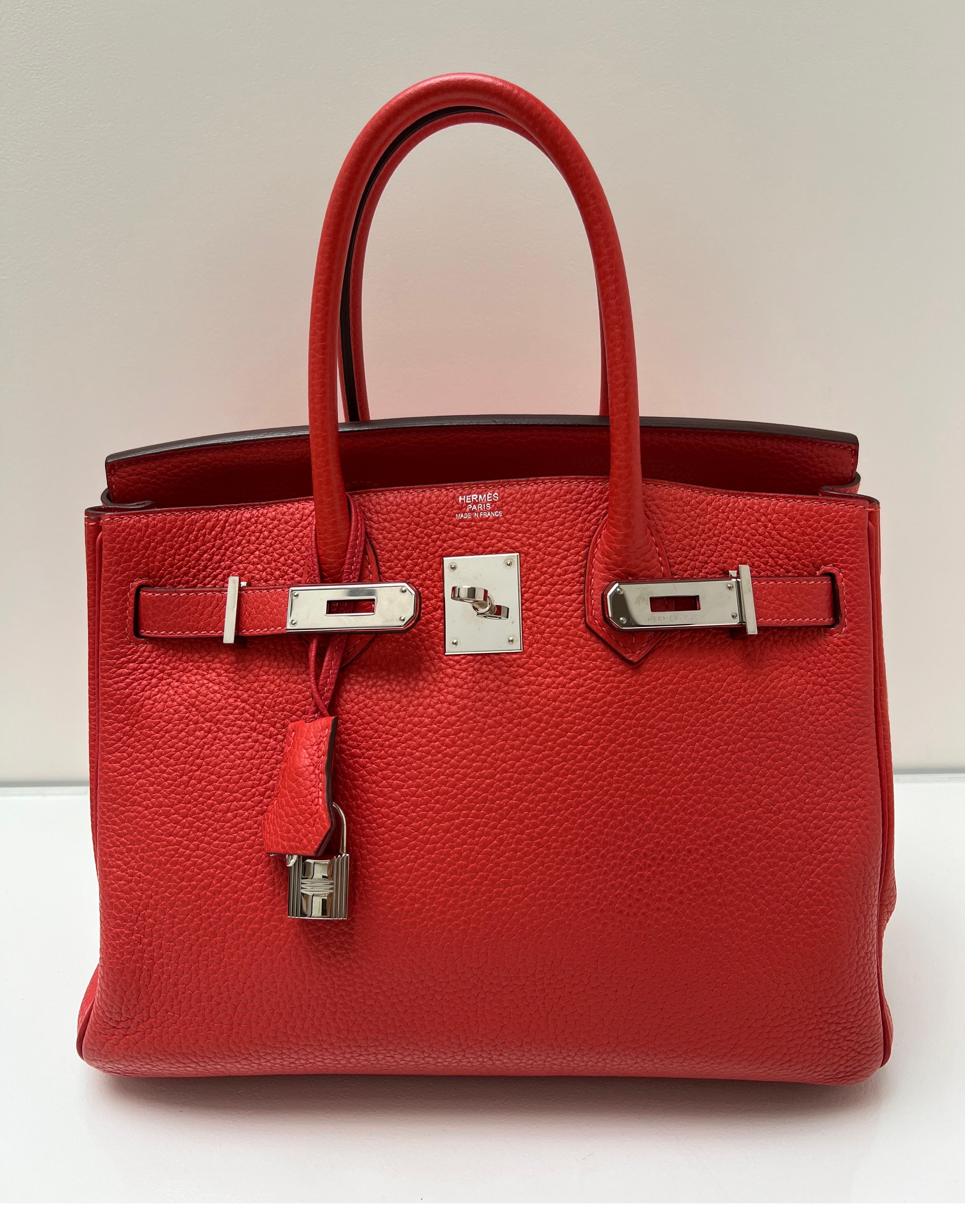 Hermes Rouge Casaque Birkin 35 Bag. Excellent like new condition. Plastic is still on the hardware. Palladium hardware. Interior clean. Looks unused. Great investment bag. Includes clochette, lock, keys, and dust bag. Guaranteed authentic. 