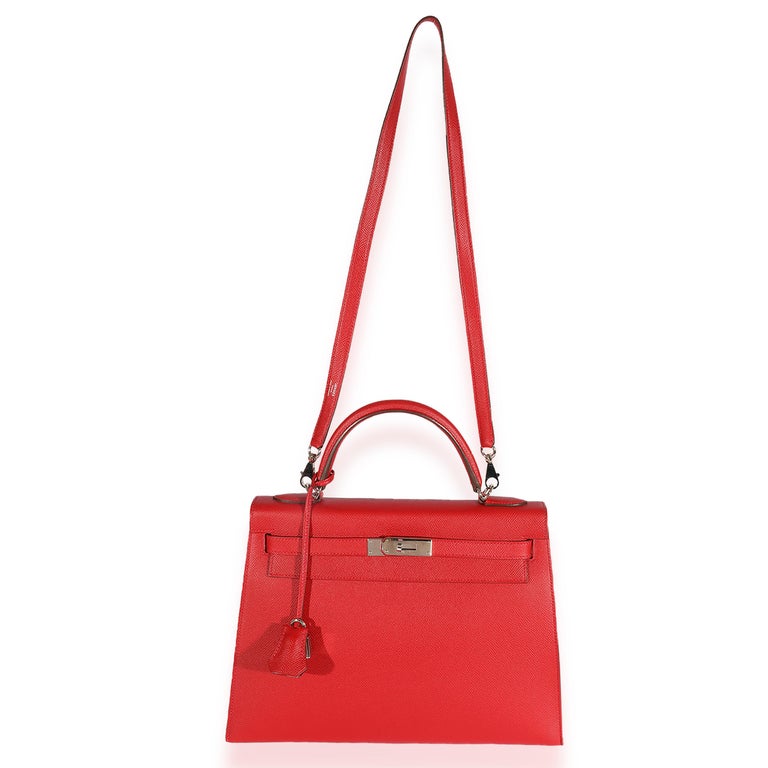 Listing Title: Hermes Rouge Casaque Epsom Kelly Sellier 32
SKU: 124558
Condition: Pre-owned 
Handbag Condition: Very Good
Condition Comments: Very Good Condition. Exterior corner scuffing and throughout. Marks and light discoloration at exterior and