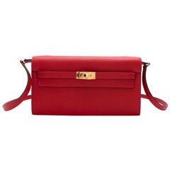 Pochette Kelly rouge casaque en cuir Epsom Hermès, GHW