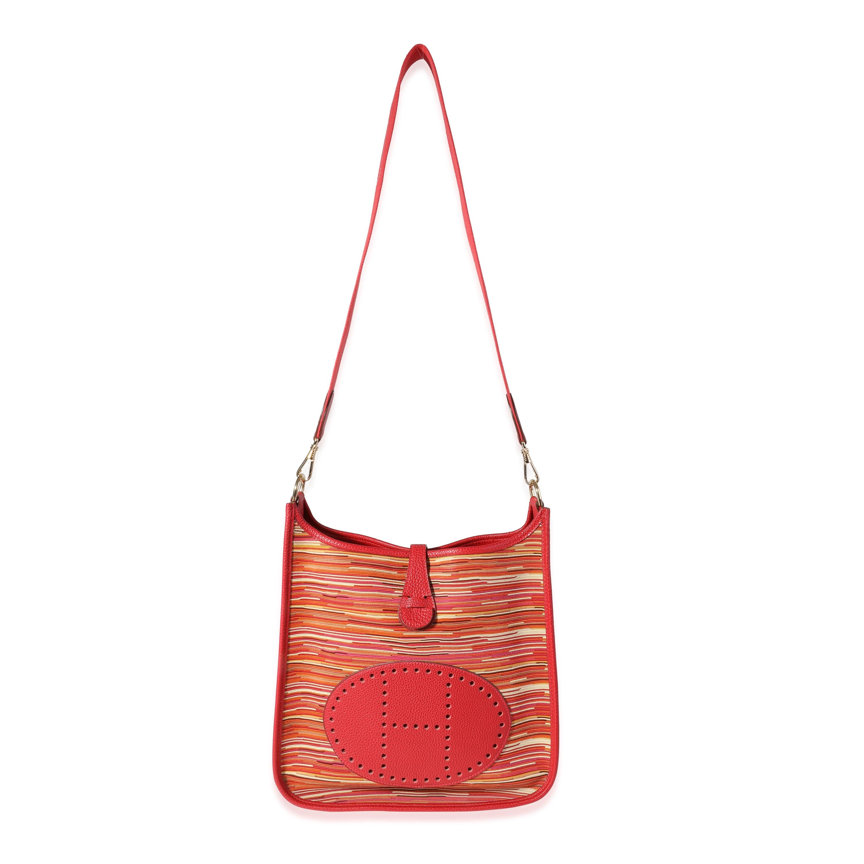 Listing Title: Hermès Rouge Casaque Togo & Vibrato Evelyne I 29 GHW
SKU: 120534
Condition: Pre-owned (3000)
Handbag Condition: Excellent
Condition Comments: Excellent Condition. Light scuffing throughout. No other visible signs of wear.
Brand: