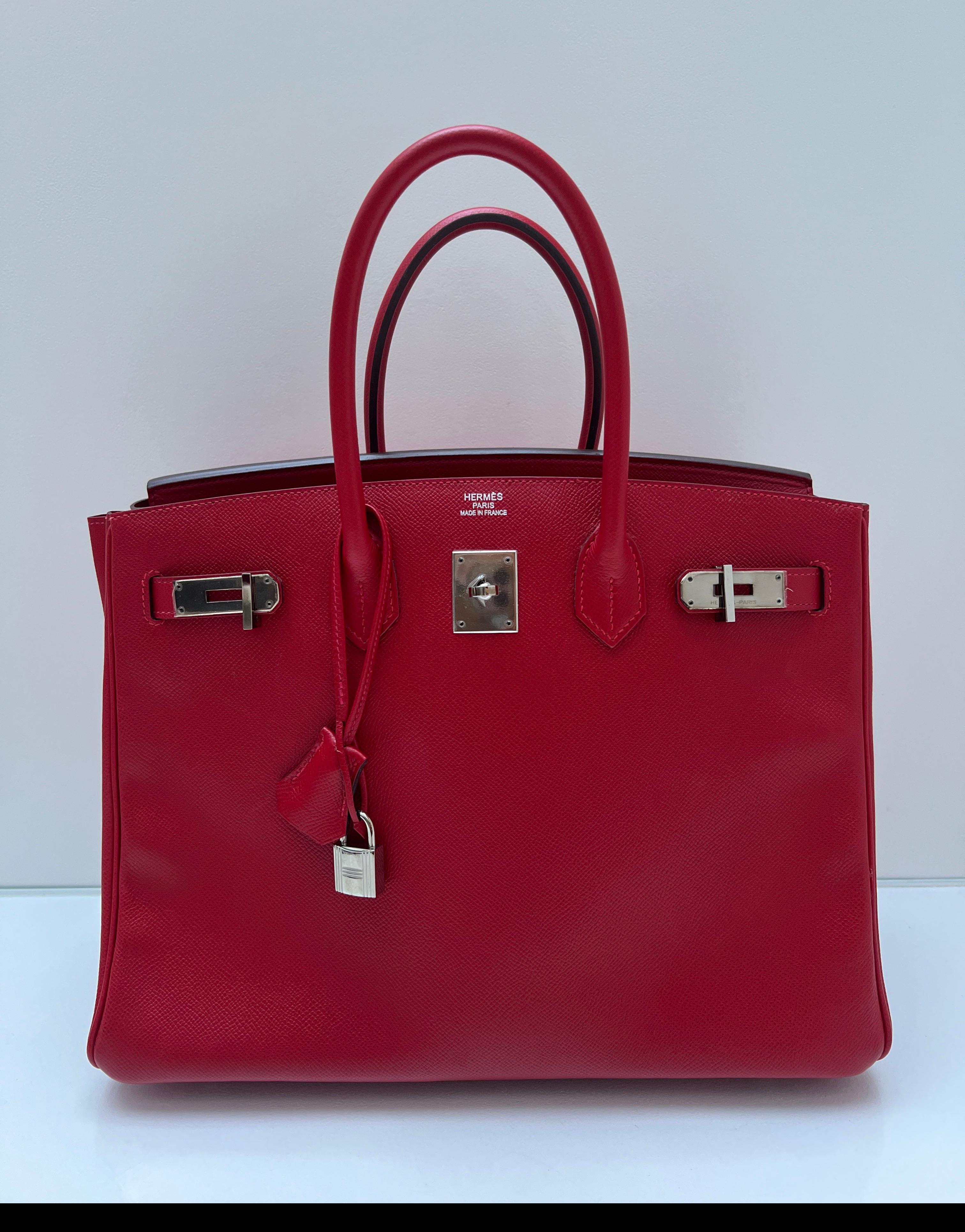 Hermes Rouge Casaque Birkin 35 Bag. Palladium silver hardware. Interior clean. Epsom leather. Vibrant red color. Includes clochette, lock, keys, and dust bag. Guaranteed authentic. 
