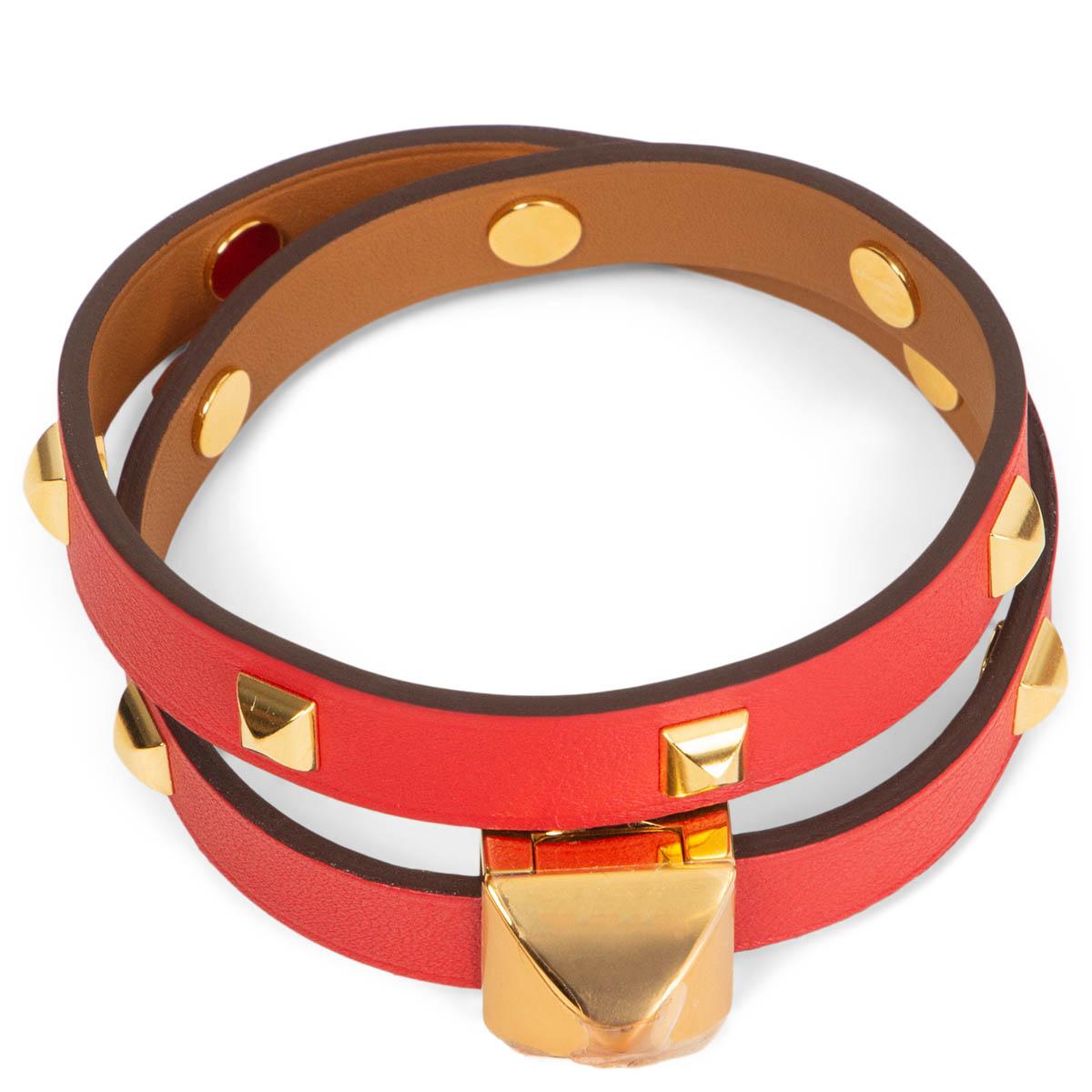 100% authentic Hermès Infini Clouté Double Tour bracelet in Rouge de Coeur in Veau Swift leather with gold-tone hardware. Brand new.  No Box.

Measurements
Tag Size	T3
Width	0.9cm (0.4in)
Length	36.6cm (14.3in)
Hardware	Gold-Tone

All our listings