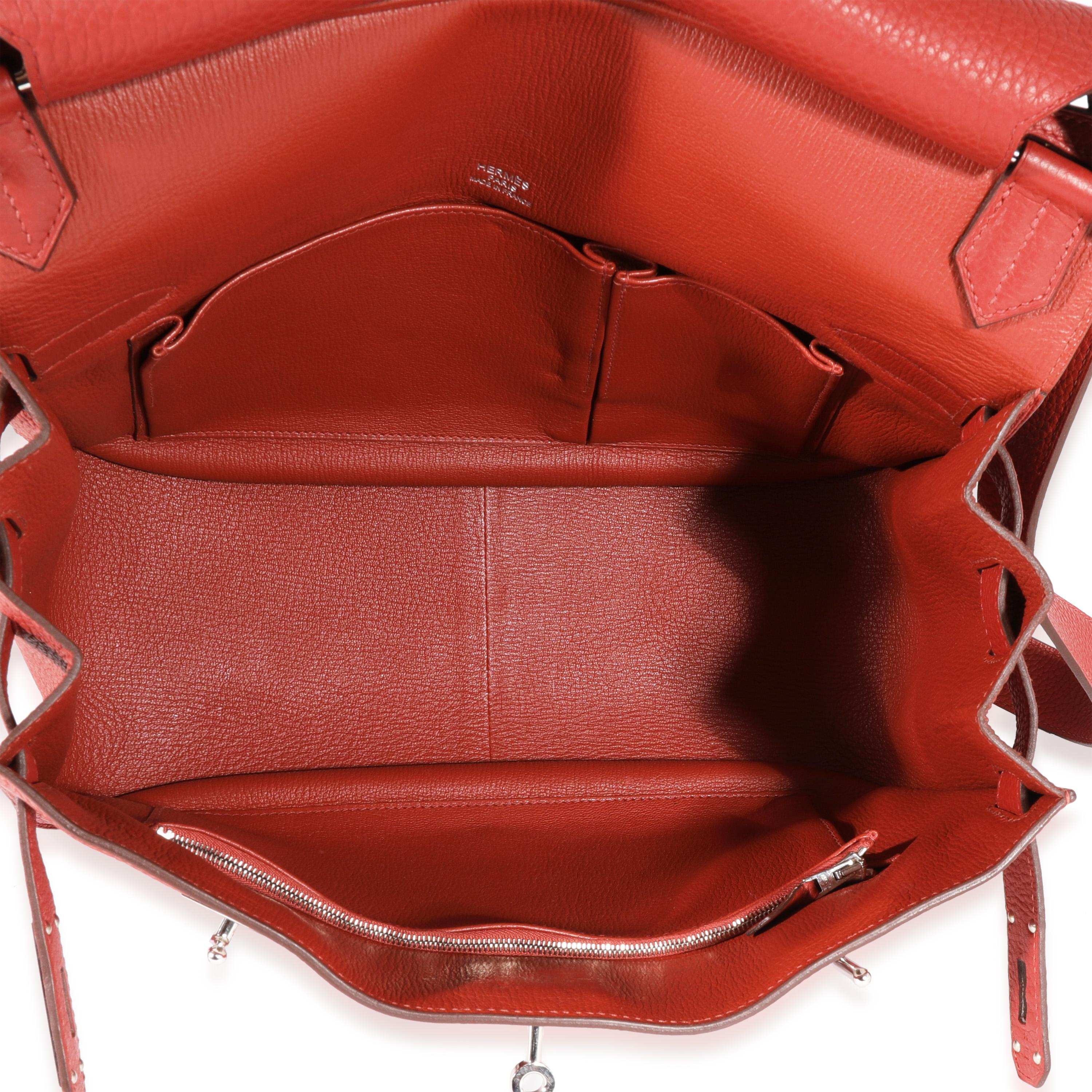 Listing Title: Hermès Rouge Duchesse Clémence Jypsiere 34 PHW
SKU: 122089
Condition: Pre-owned 
Handbag Condition: Excellent
Condition Comments: Excellent Condition. Plastic on some hardware. Faint scuffing to leather. Scratching to hardware. No