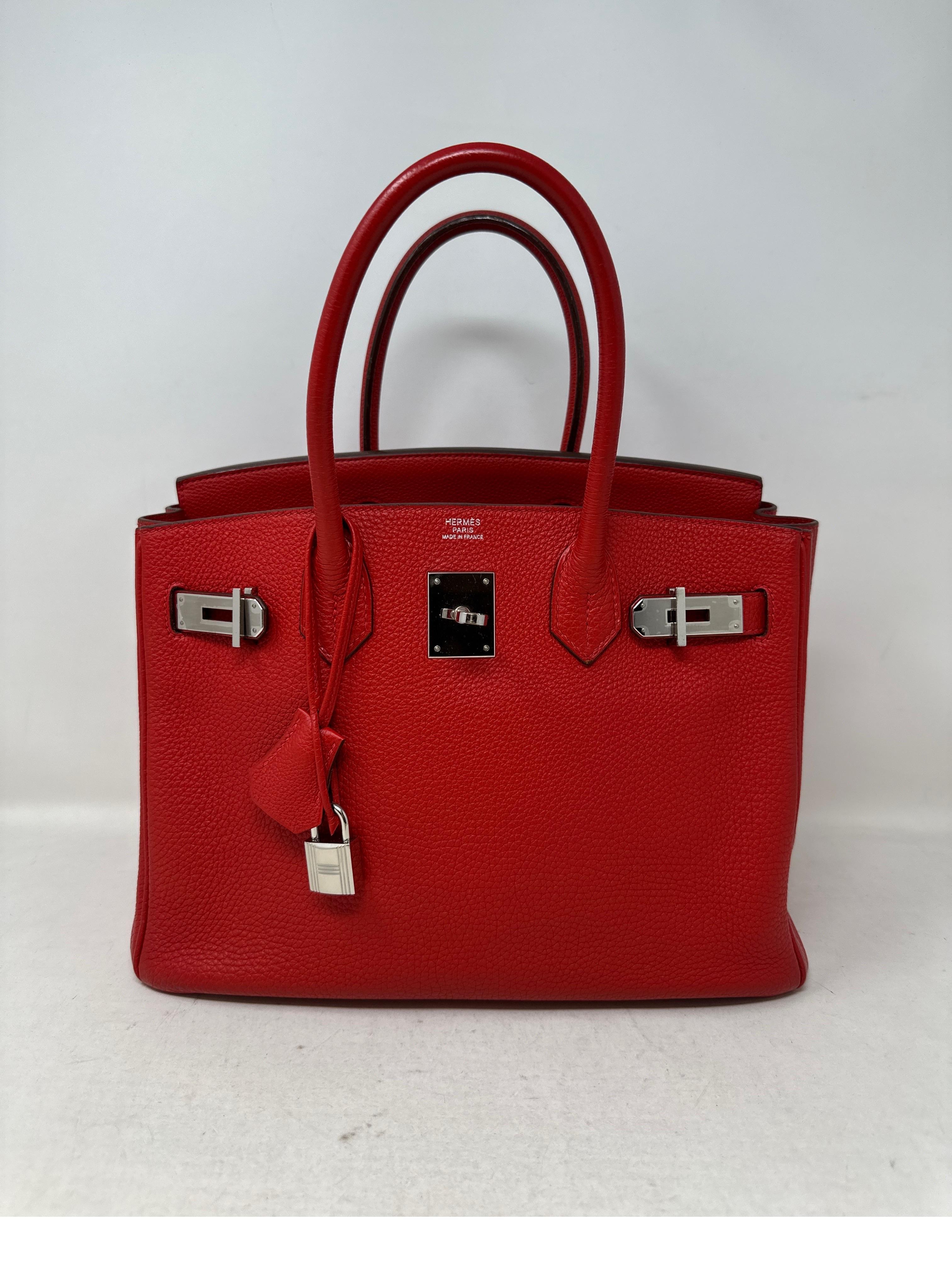 Hermes Rouge Garance Birkin 30 Bag. Excellent condition. Stunning red color togo leather. Palladium hardware. Interior clean. Most wanted size 30. Includes clochette, lock keys, and dust bag. Guaranteed authentic. 