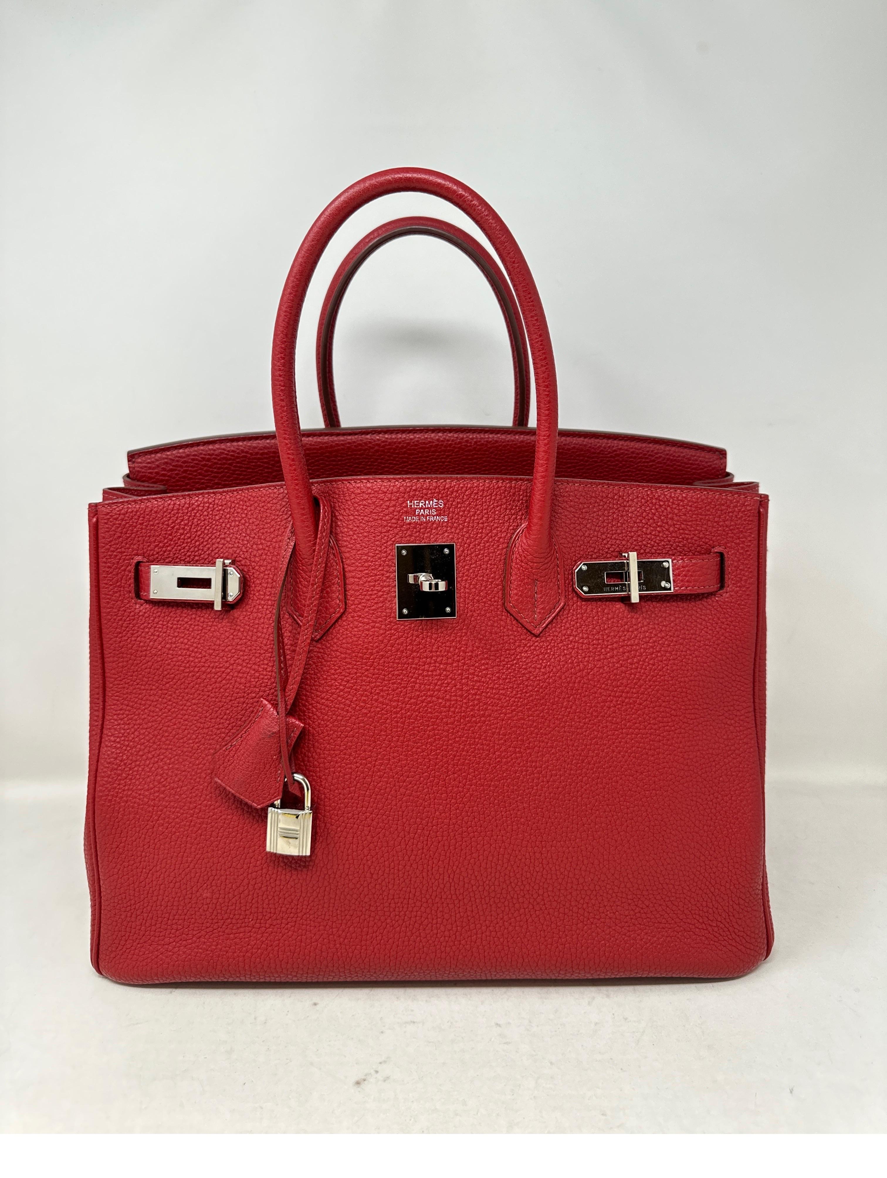 Hermes Rouge Garance Birkin 35 Bag. Deep red color Birkin with palladium silver hardware. Good condition. Looks like new. Interior clean. Includes clcohette, lock, keys, and dust bag. Guaranteed authentic. Don't miss out on this one. Priced to sell