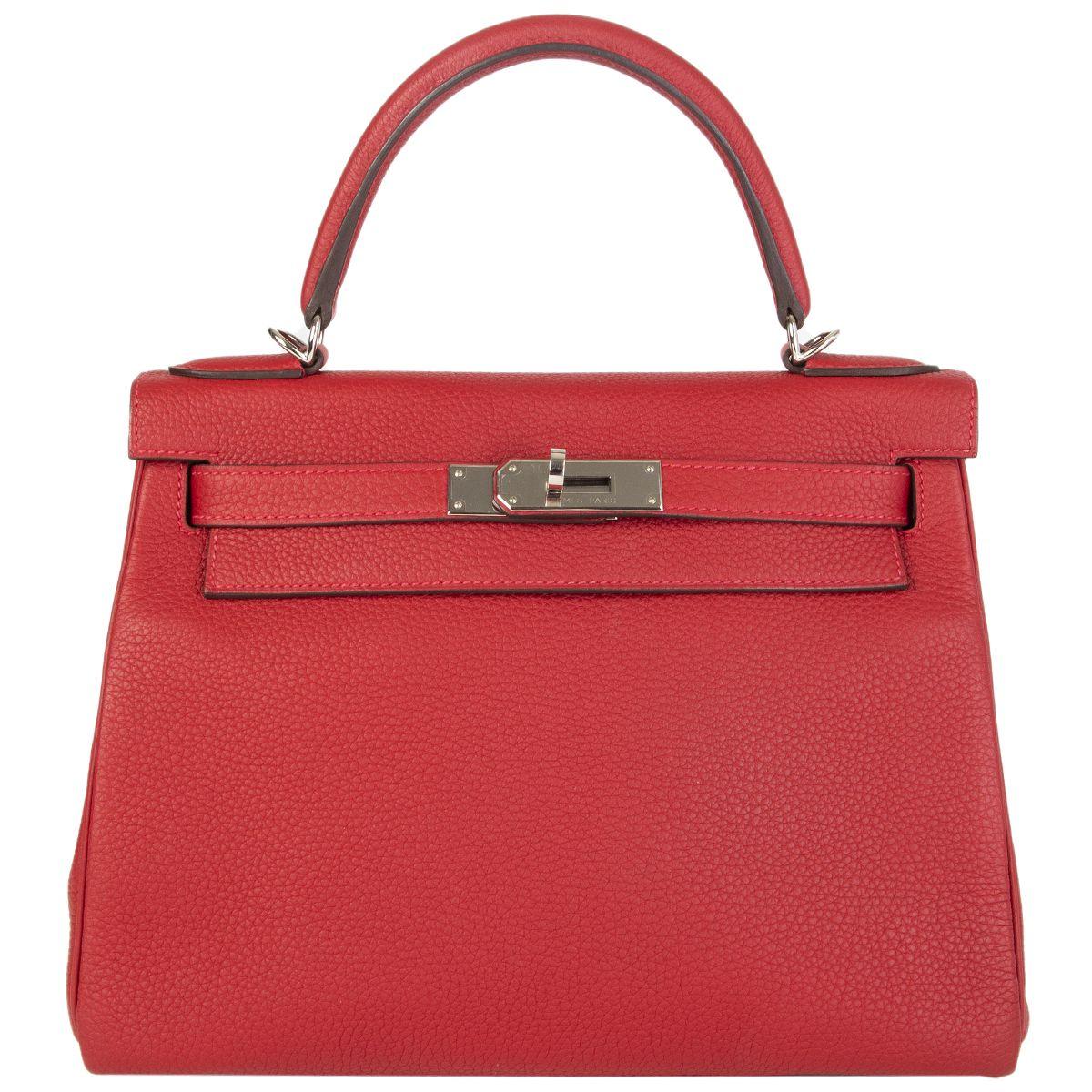 Hermès 'Kelly II 28' bag in Rouge Garance Veau Togo leather with palladium hardware. The interior is lined in Chevre (goat skin) with a divided open pocket against the front and a zipper pocket against the back. Has been carried and is in virtually