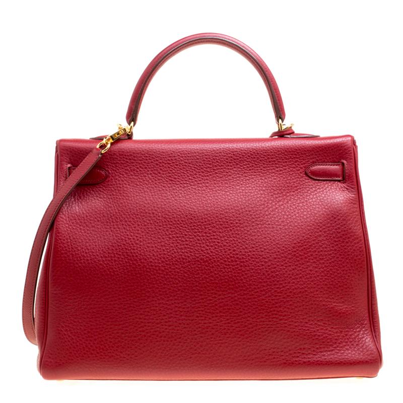 Inspired by none other than Grace Kelly of Monaco, Hermes Kelly is carefully hand stitched to perfection. This Kelly Retourne is crafted from Rouge Garance Togo leather and has gold tone hardware. Retourne has a more casual look and is stitched on