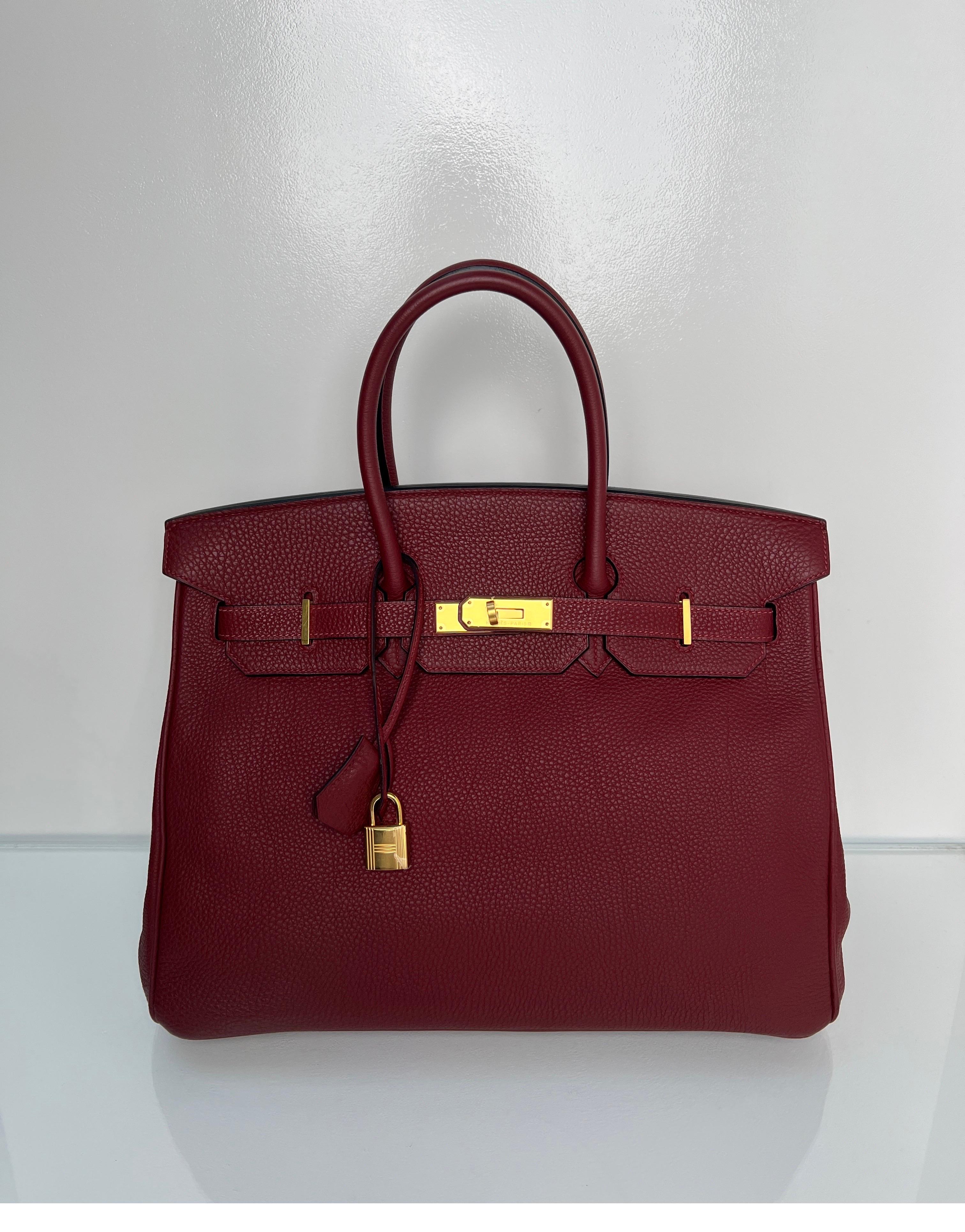 Hermes Rouge H Birkin 35 Bag. Excellent condition. Togo leather. Gold hardware. Interior clean. Plastic is still on hardware. Most wanted color of the year. Rare color and great investment bag. Priced to sell quickly. Includes clochette, lock, keys,