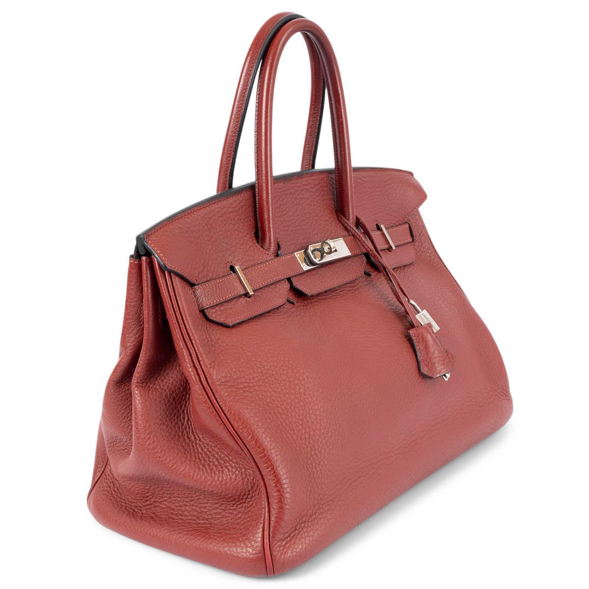 100% authentic Hermès Birkin 35 bag in Rouge H Taurillon Clemence leather. Lined in Chevre (goat skin) with an open pocket against the front and a zipper pocket against the back. Has been carried and shows soft wear to the corners and slight color