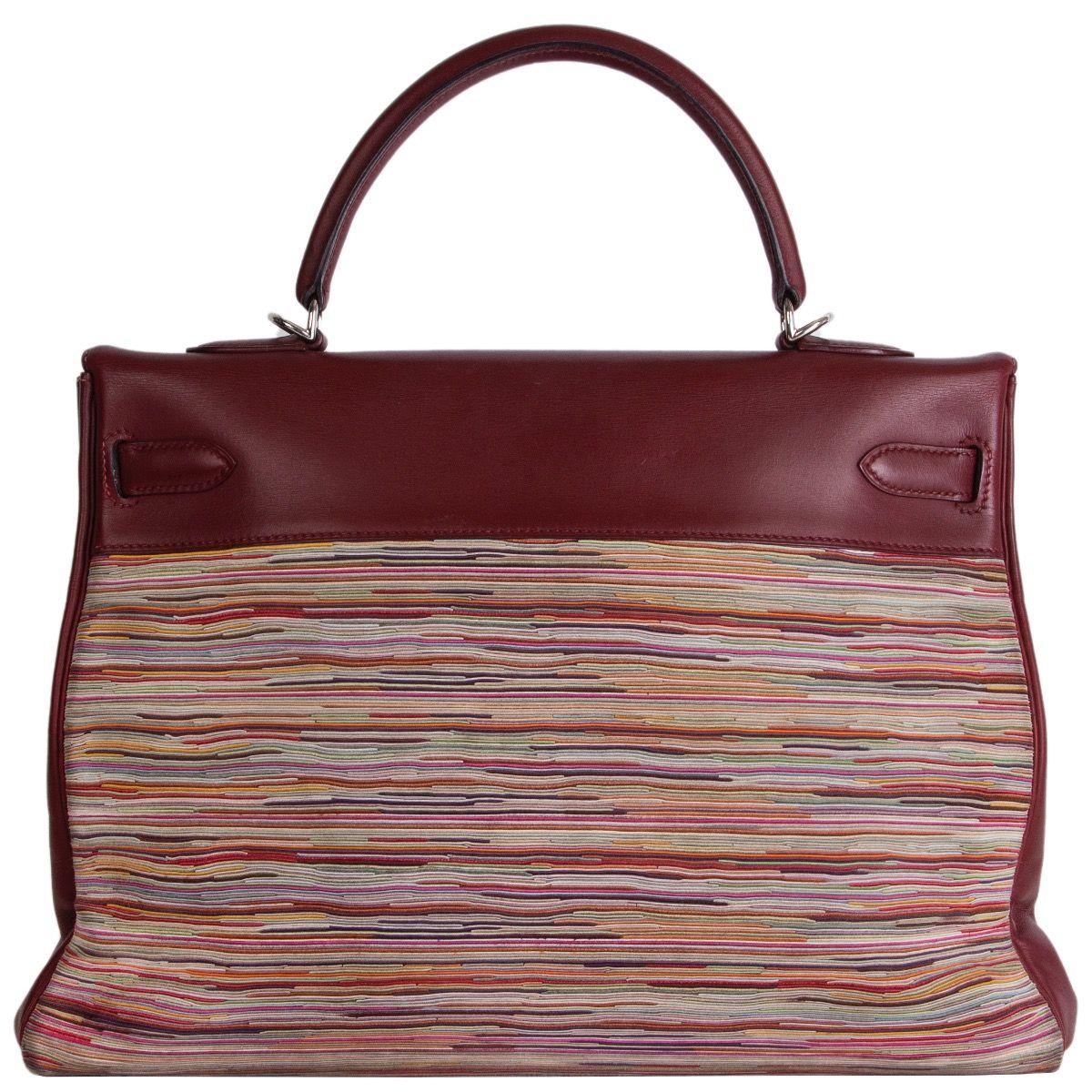 Hermes 'Kelly II 35 Retourne Vibrato' bag in Rouge H (burgund) Veau Evercalf leather with multicolor Vibrato panel. Rare limited edition. Lined in Rouge H Chèvre (goat skin) with two open pockets against the front and a zipper pocket against the