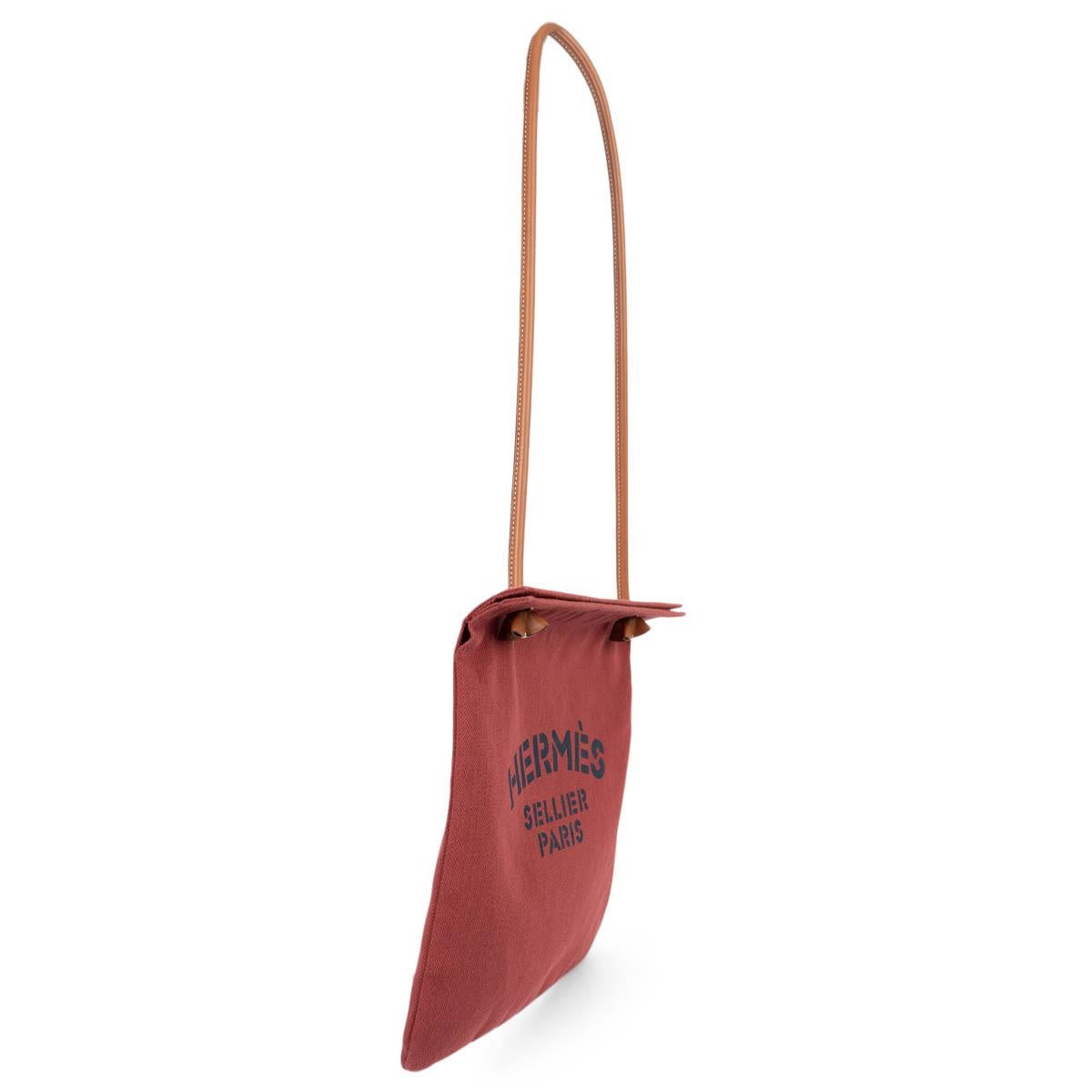 100% authentic Hermès Aline grooming bag in Rouge H (burgundy) herringbone canvas with 'Hermès Sellier Paris' print and Gold (camel) Veau Swift leather shoulder strap. Has been carried once and is in virtually new condition. Come with dust bag.