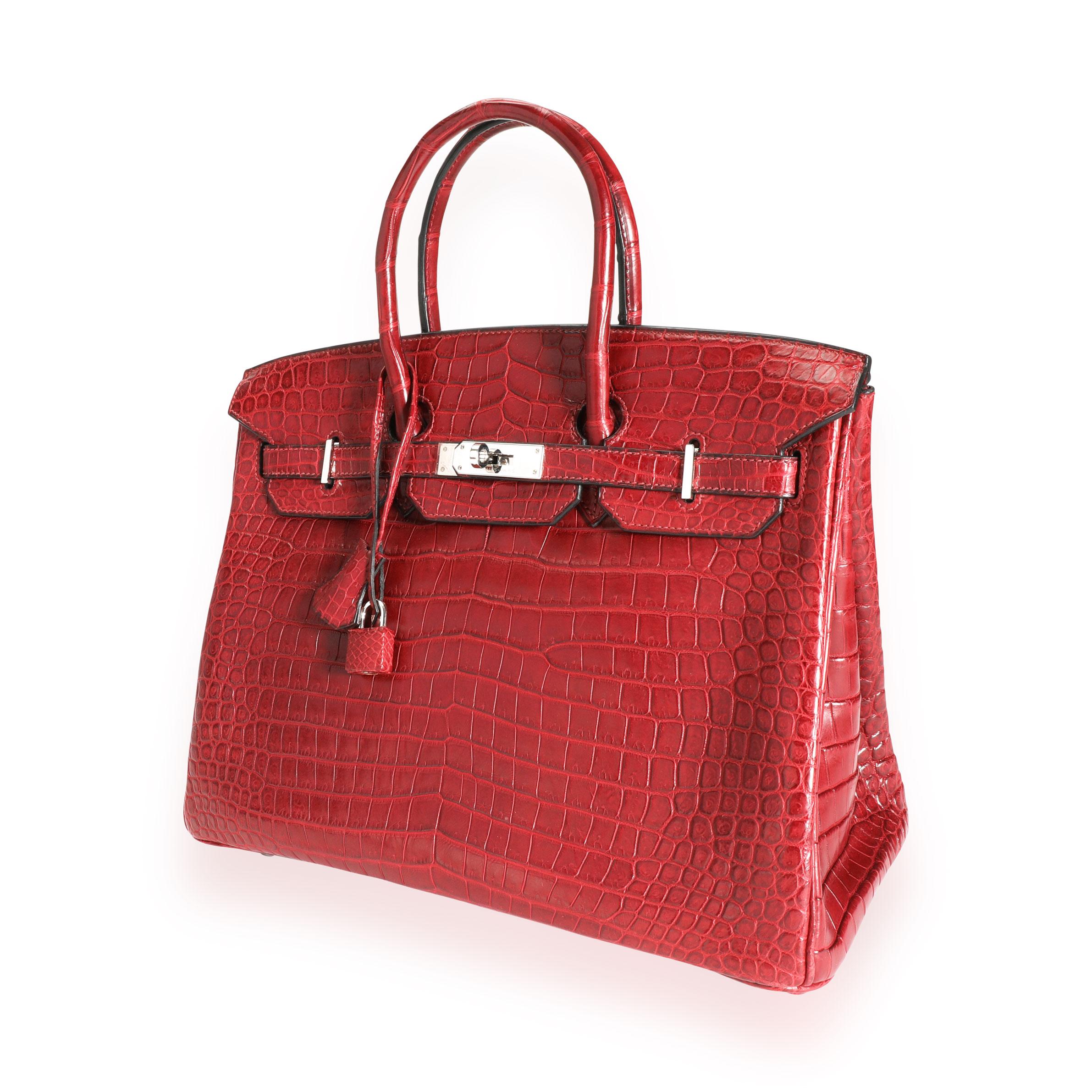 Hermès Rouge H Matte Porosus Crocodile Birkin 35 PHW
SKU: 111789
MSRP:  
Condition: Pre-owned (3000)
Condition Description: 
Handbag Condition: Very Good
Condition Comments: Very Good Condition. Plastic on some hardware. Light scratching to