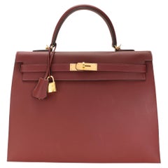 Hermès Rouge H Sombrero Sellier Kelly 35 GHW with Striped Canvas Strap