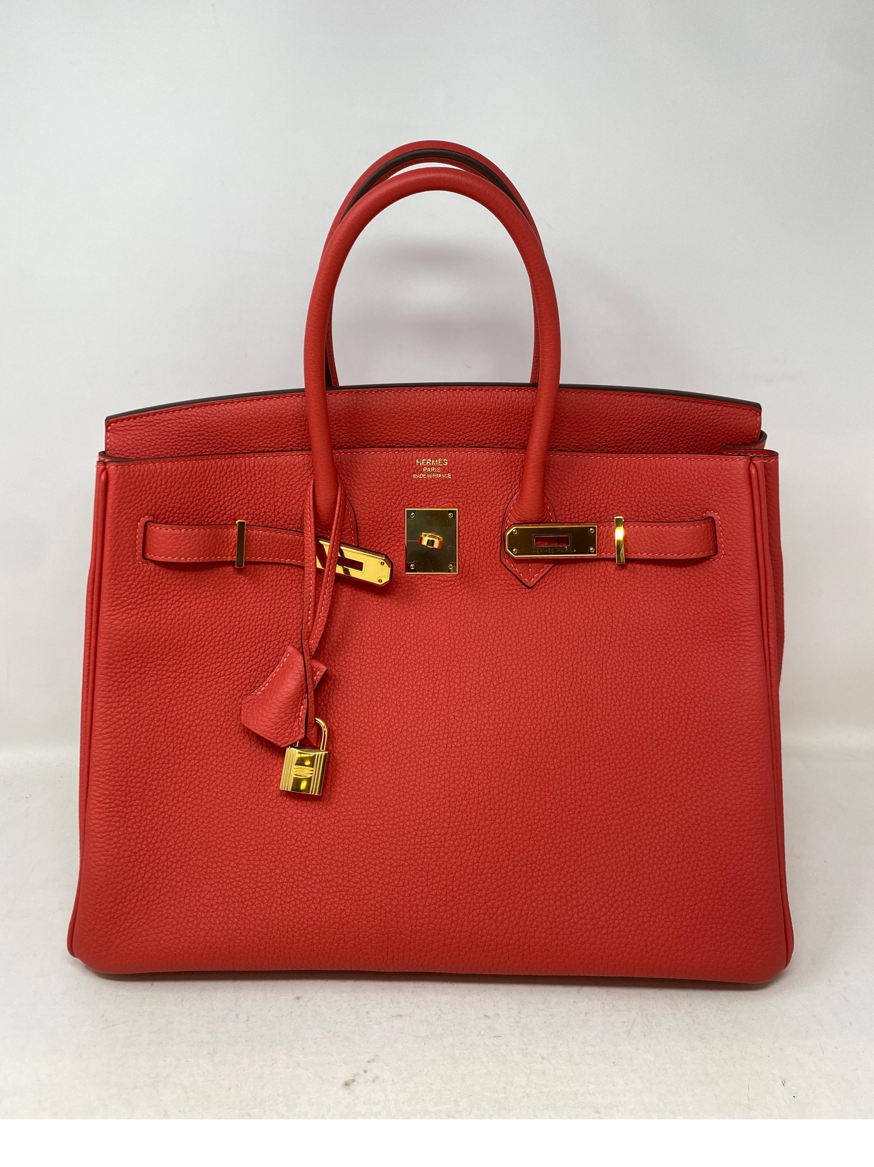 Hermes Rouge Pivoine Birkin 35 Bag. Excellent condition. Gold hardware. Togo leather. Bag looks like new. Pink red color that is highly collected. Includes insert. clochette, lock, keys, and dust bag. Guaranteed authentic. 