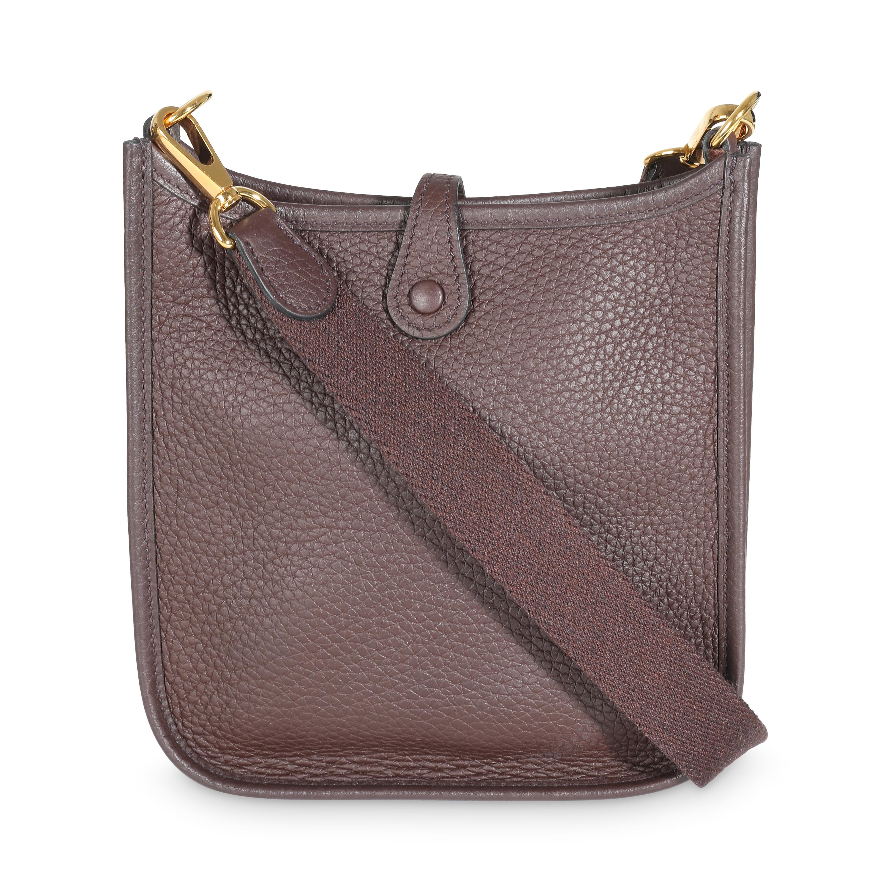 Listing Title: Hermès Rouge Sellier Clemence Mini Evelyne TPM GHW
SKU: 141298
Condition: Pre-owned 
Condition Description: Designed in 1978 by Evelyne Bertrand, the Evelyne shoulder bag from Hermès has a distinctive aesthetic thanks to a perforated