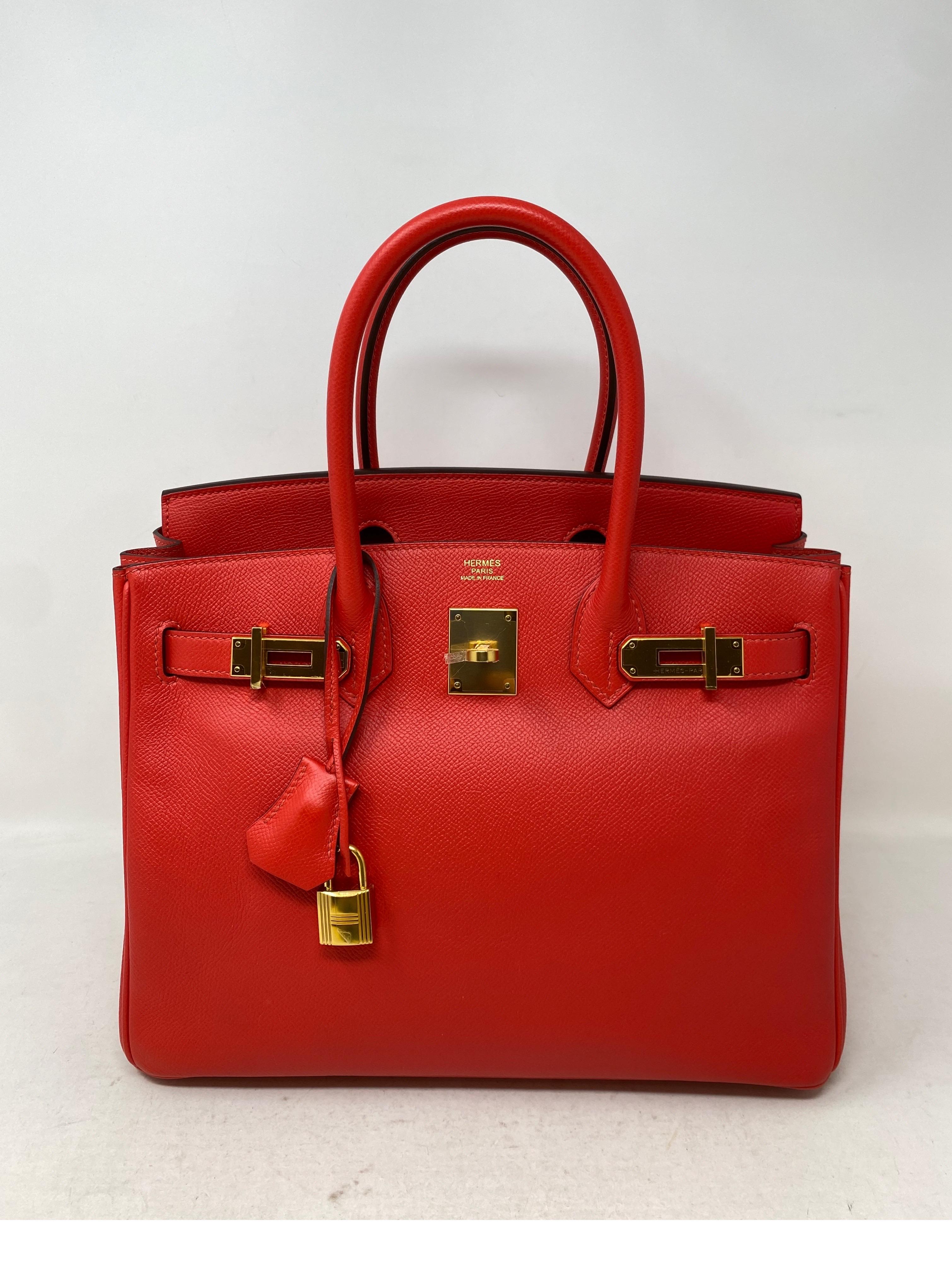 Hermes Rouge Tomate Birkin 30 Bag. Beautiful bright red color Birkin. The most wanted size 30. Epsom leather with gold hardware. Stunning combination. The red color of the season. Don't miss out. Looks like new condition. Excellent exterior with