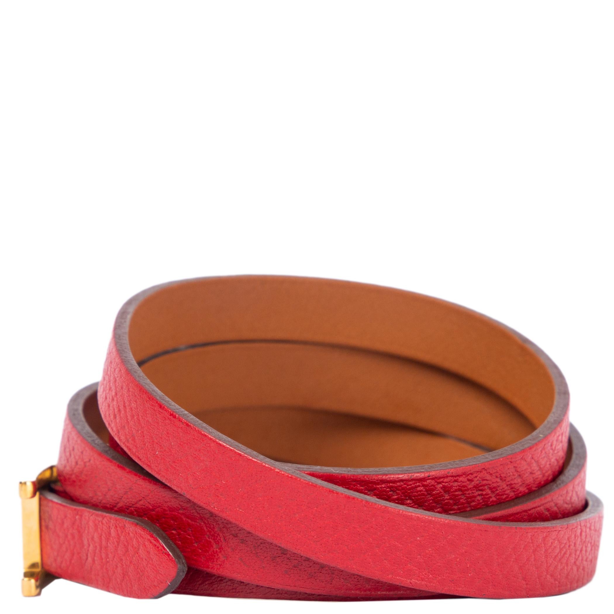 100% authentic Hermès Hapi 3 Bracelet in size S. The bracelet is a long strap of Rouge Tomate Epsom calfskin leather that wraps around the wrist three times and closes with a gold-plated Hermès H buckle. Has been worn and is in excellent