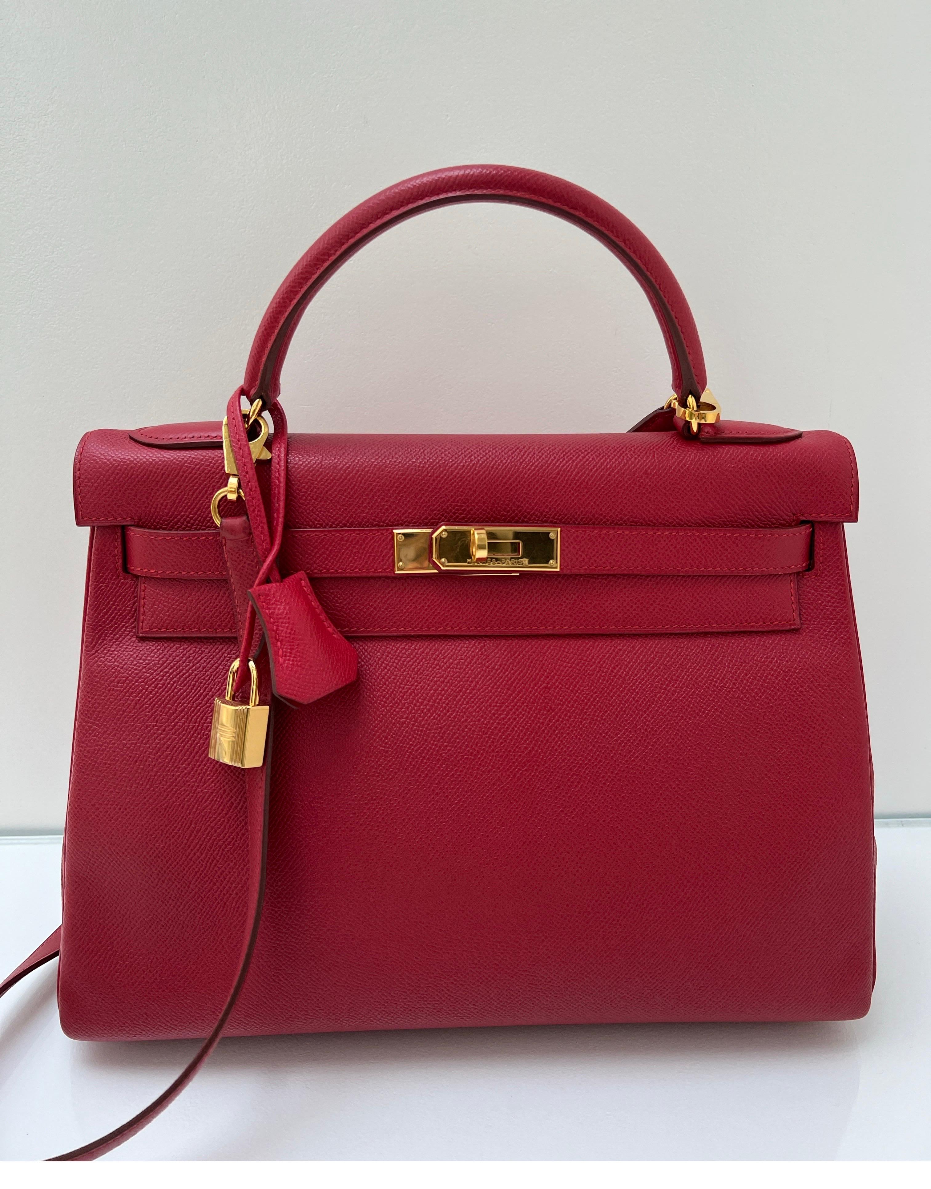 Hermes Rouge VIF Courchevel leather Kelly 32 bag. Vintage Kelly bag in excellent condition. Gold hardware. Stunning red color bag. Interior clean. Great investment bag. Includes clochette, lock, keys, and dust bag. Guaranteed authentic. 