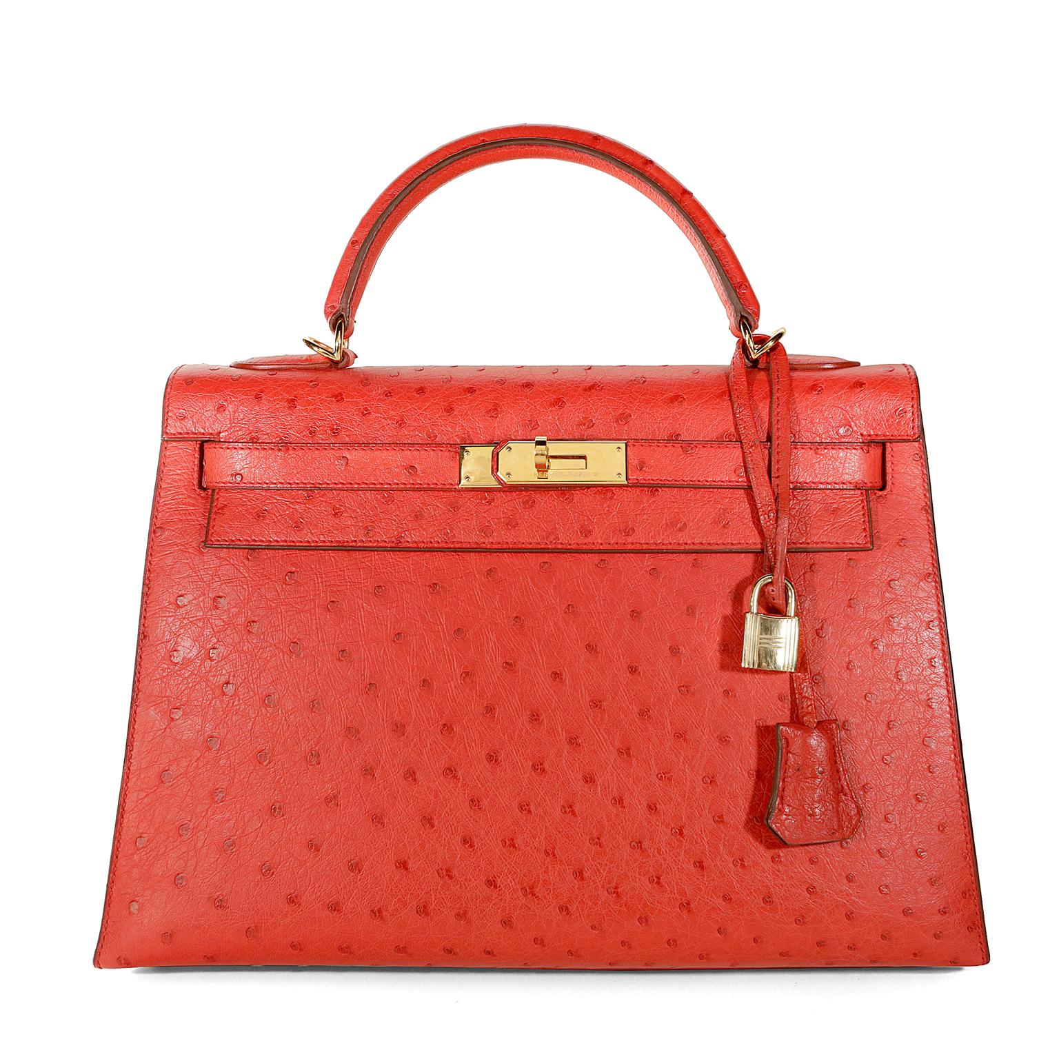 Hermès Rouge VIF 32 cm Kelly-  Excellent Plus Condition
Hermès bags are considered the ultimate luxury item worldwide.  Each piece is handcrafted with waitlists that can exceed a year or more.  The streamlined and demure Kelly style is always in