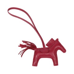 Hermes Rubis Agneau Milo Lambskin Leather Rodeo PM Charm