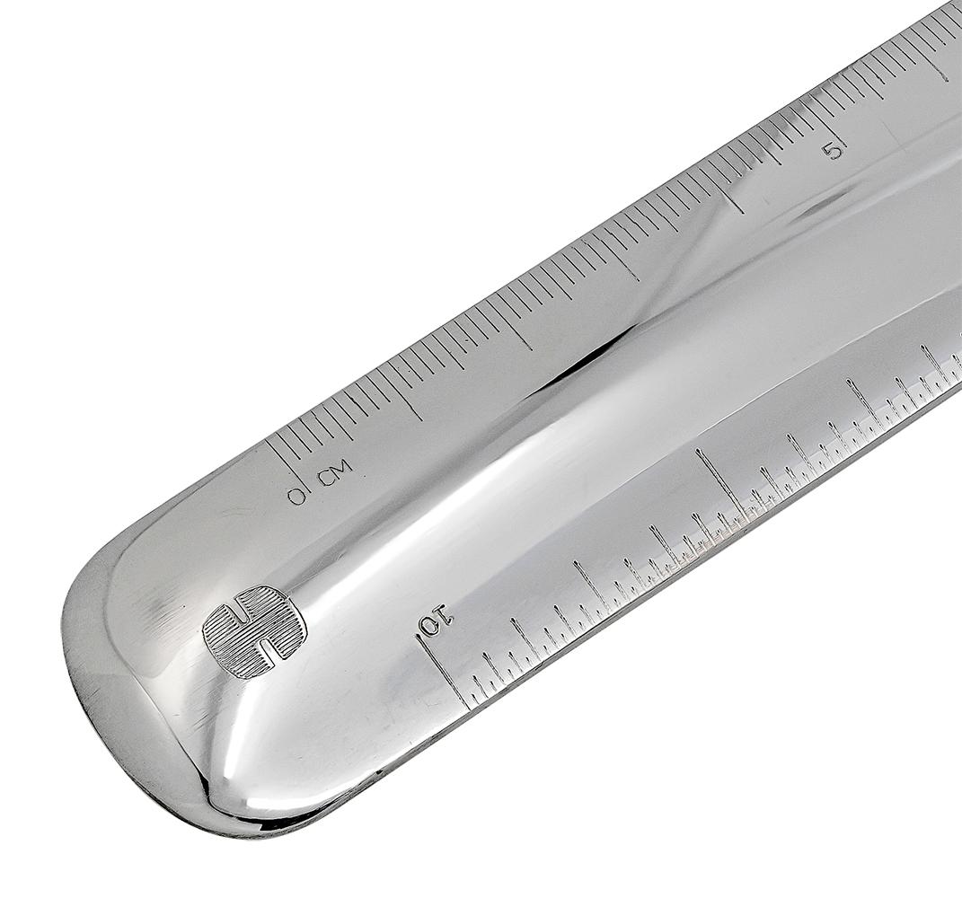 Most impressive ruler.  Made and signed by HERMES.  Very heavy gauge silver plate.  Rounded corners and a soft curvature on top.  Measures 10