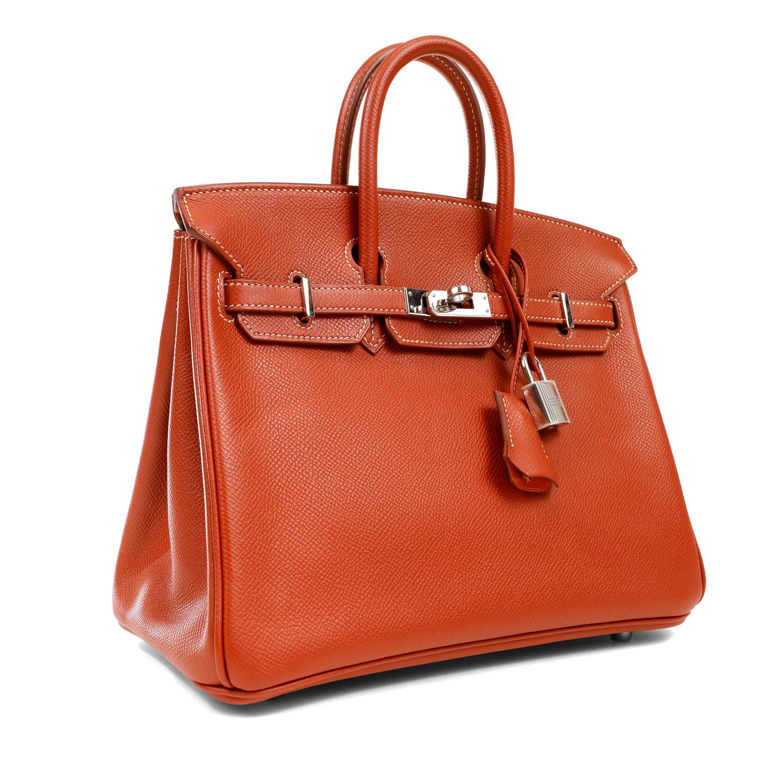 This authentic Hermès Rust Epsom 25 cm Birkin is in excellent condition.  Considered the ultimate luxury item, the Hermès Birkin is stitched by hand. Waitlists are commonplace and the 25 cm silhouette is in highest demand. 
Epsom leather is textured