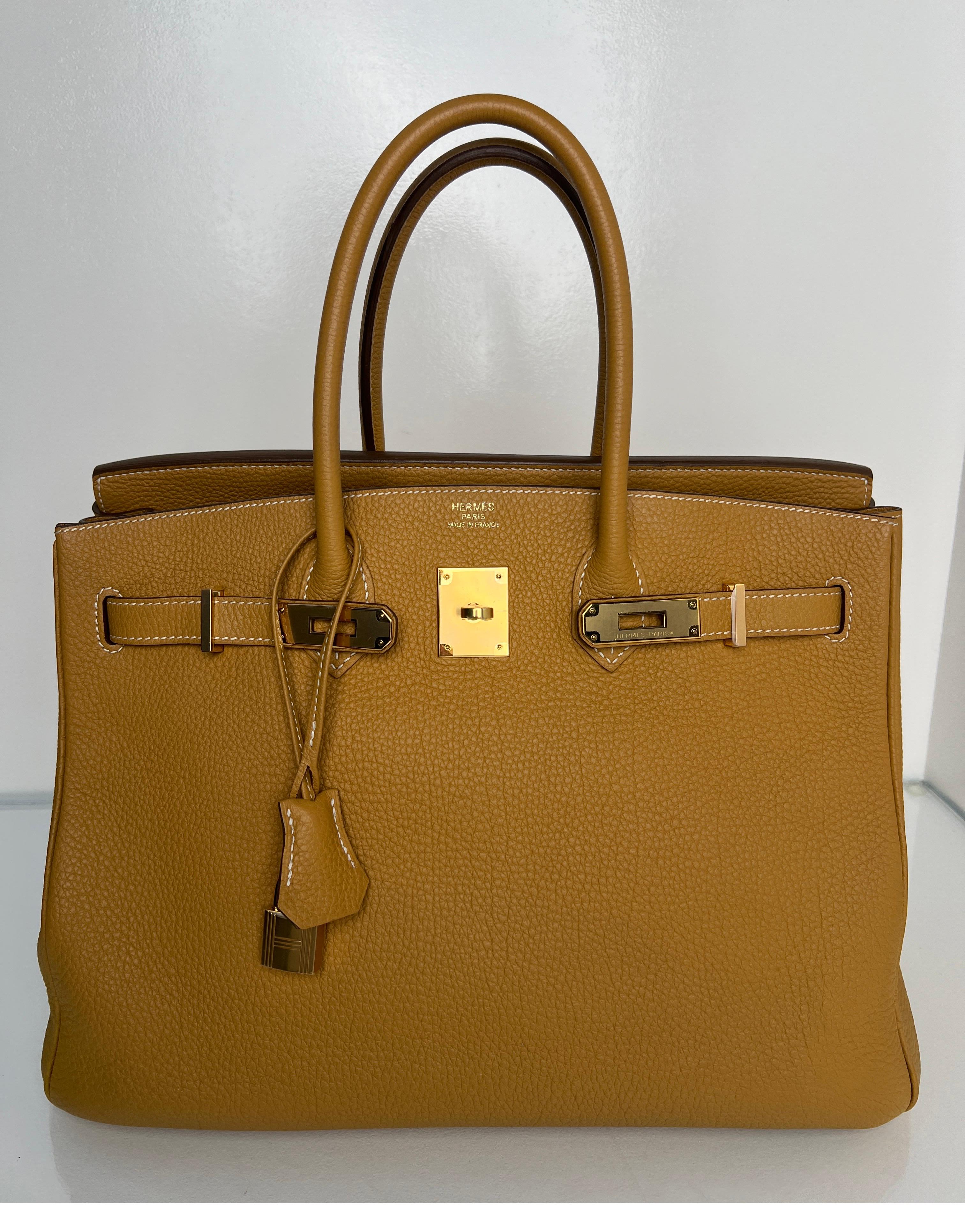 Bolso Hermes Sable 35 Birkin. Excelente estado. Gran color tostado neutro. Herrajes dorados. Interior limpio. El plástico sigue estando en el hardware. Incluye clochette, candado, llaves y bolsa guardapolvo. Autenticidad garantizada. 