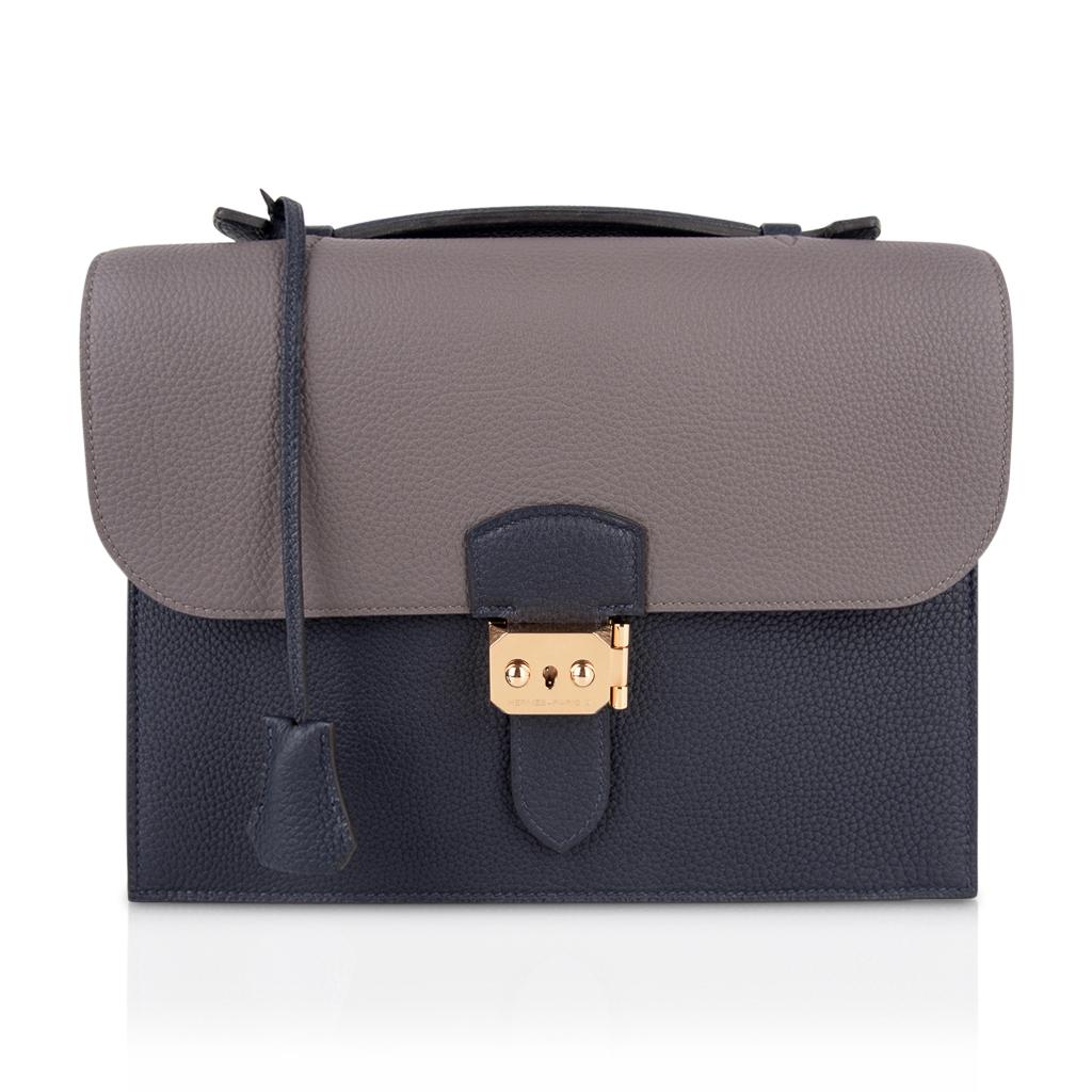 Mightychic offers a guaranteed authentic very rare Sac a Depeche 27 HSS Horizons Limited Edition bag  / briefcase.
Rich Blue Nuit and Etain in Togo leather.
Gold hardware.   
The bag comes with keys, clochette, box and sleeper.
NEW or NEVER WORN.