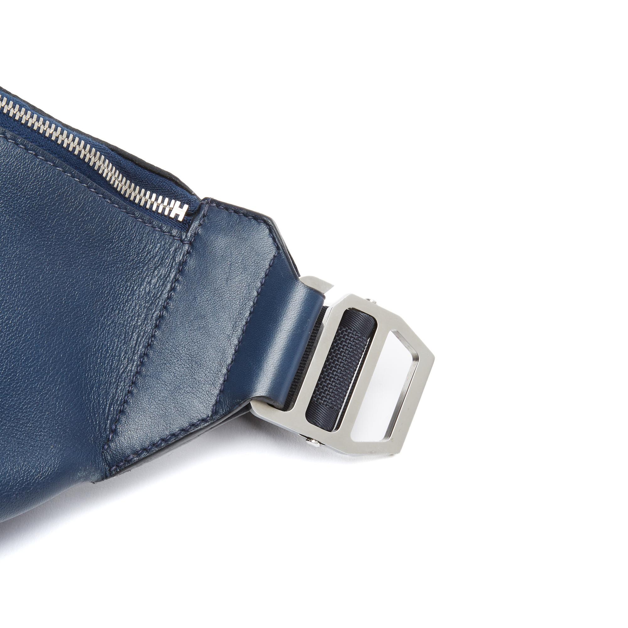 XL belt pouch or Cityslide bag, Large Model version, in blue leather (probably Swift) and silver metal (palladium), a first front pocket closed by a zip with leather pull, a large interior canvas compartment with a zipped pocket closed by a zip with