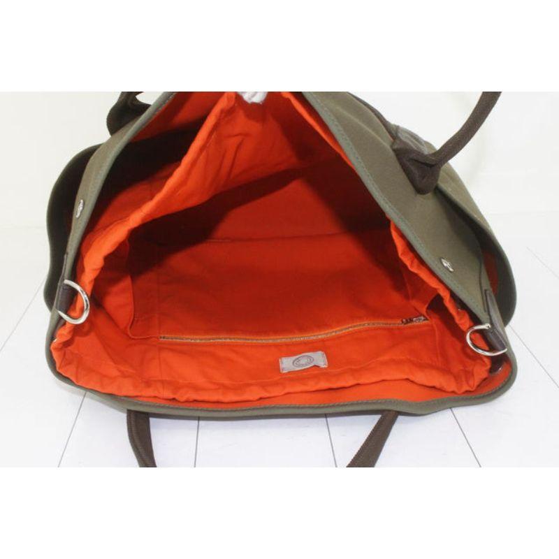 Die Sac De Pansage Groom Tragetasche von Hermes besteht aus khakifarbenem Segeltuch mit Feu-Innenausstattung für Damen oder Herren im Angebot