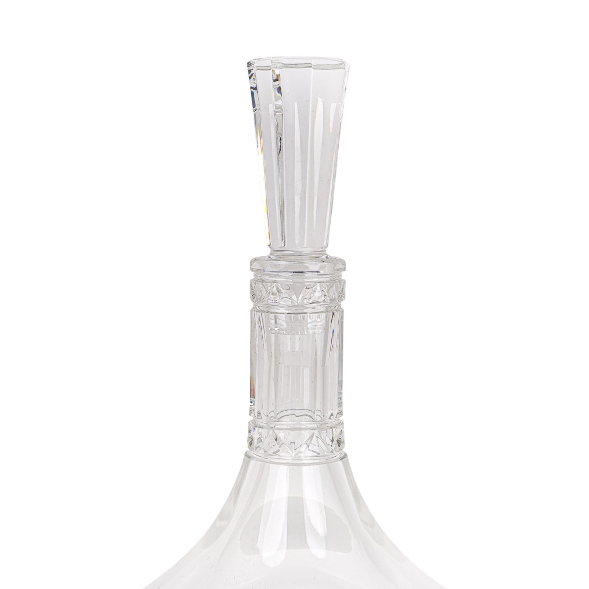 Mightychic offers an Hermes Iskender crystal wine decanter.
Modern and elegant with faceted details.
Octagonal faceted stopper.
Cristal Hermes Paris acid etched on bottom.
Comes with signature Saint Louis box.
New or Store Fresh Condition.
final
