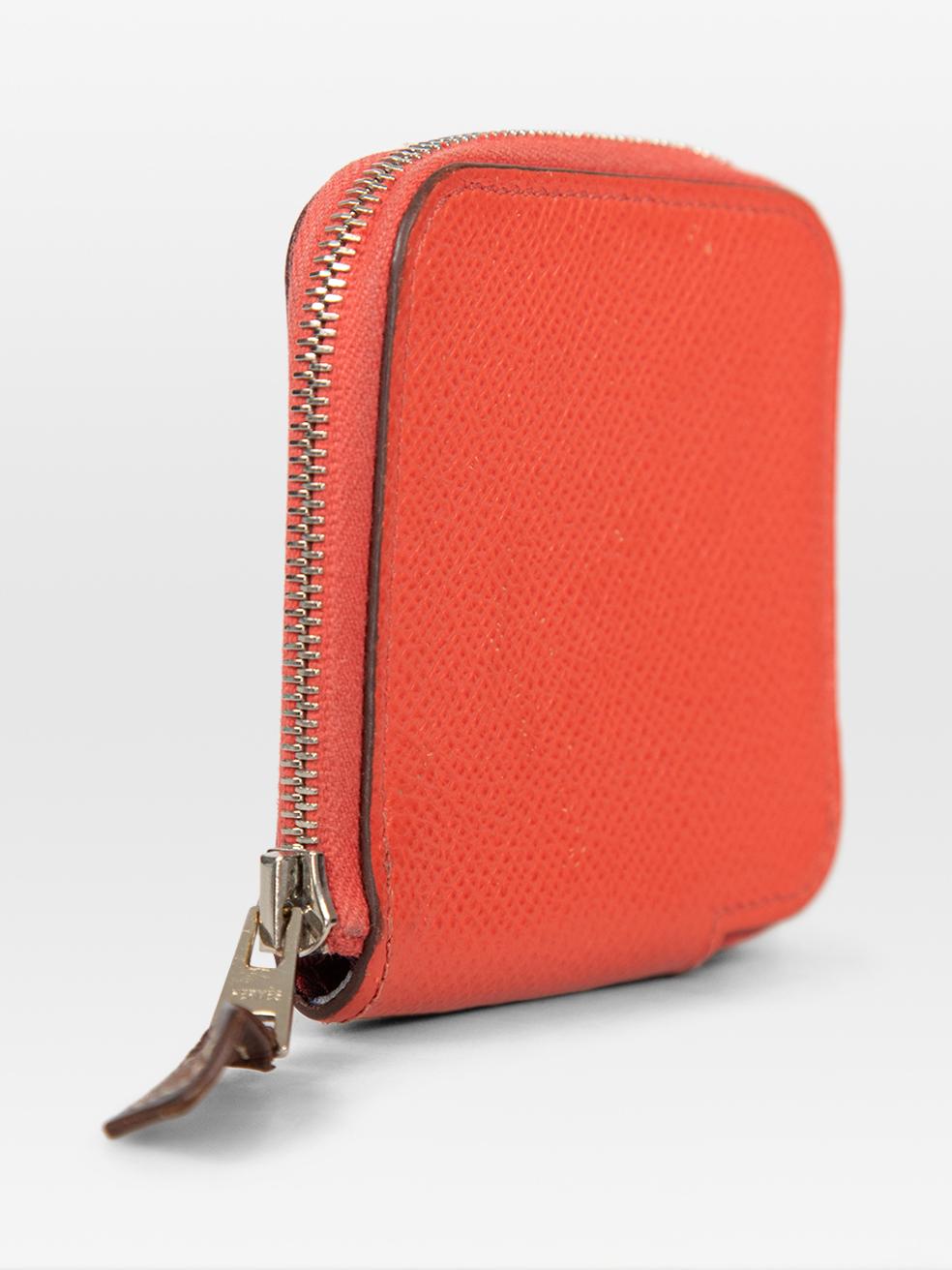 CONDITION is Very good. Minimal wear to pouch is evident. Minimal discolouration to zipper pull, the front lower left corner and the internal corners of the pouch. Minor scratches to the front and back of the leather surface on this used Hermès