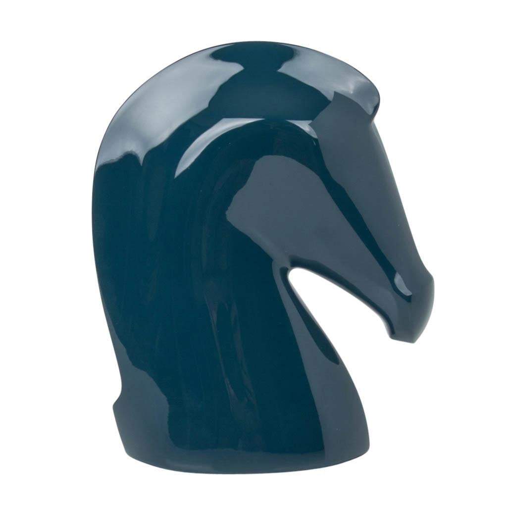 Guaranteed authentic Hermes Bleu Chrome horse head crafted in hand lacquered wood.
This exquisite paperweight can serve as a stand alone.
Orange suede base stamped HERMES Paris
New or Store Fresh Condition

HORSE HEAD MEASURES: 
HEIGHT