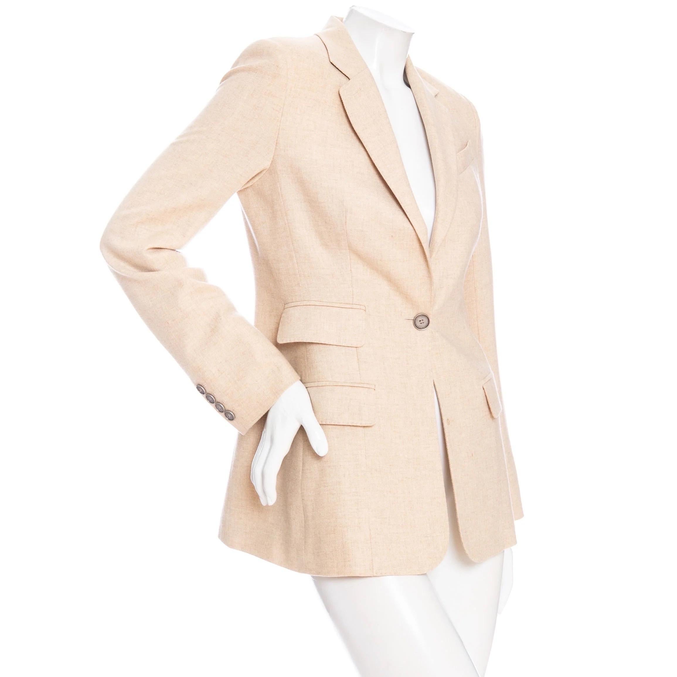 Hermès Sand Cashmere Single-Breasted Blazer 

Sand/Beige
Single-breasted
Button fastening
Notched collar
Asymmetrical front flap pockets
Cuff buttons
Jacquard lining
Fitted silhouette
Made in France
Good preowned condition; moderate staining in