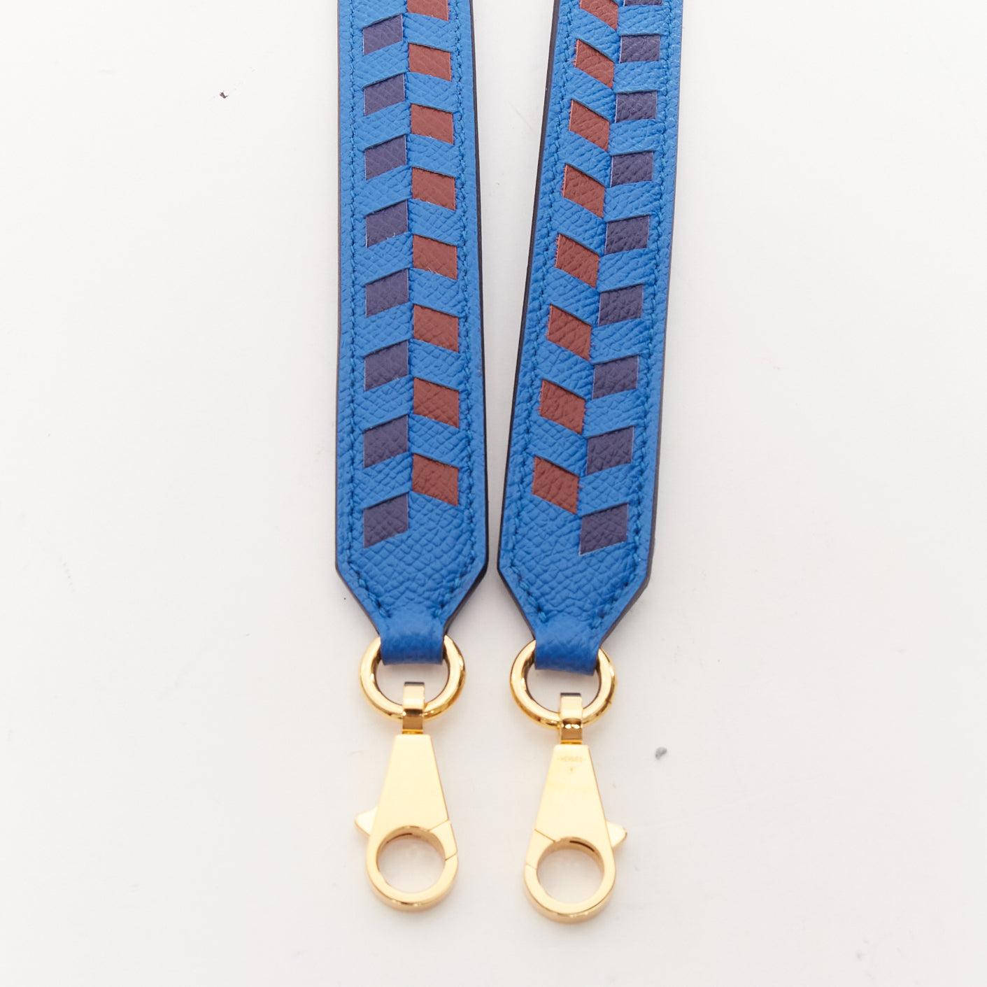 HERMES Sangle 25 blue brown woven leather gold hardware bag strap
Reference: AAWC/A01186
Brand: Hermes
Model: Sangle 25
Material: Leather
Color: Blue, Brown
Pattern: Solid
Closure: Lobster Clasp
Lining: Blue Leather
Made in: