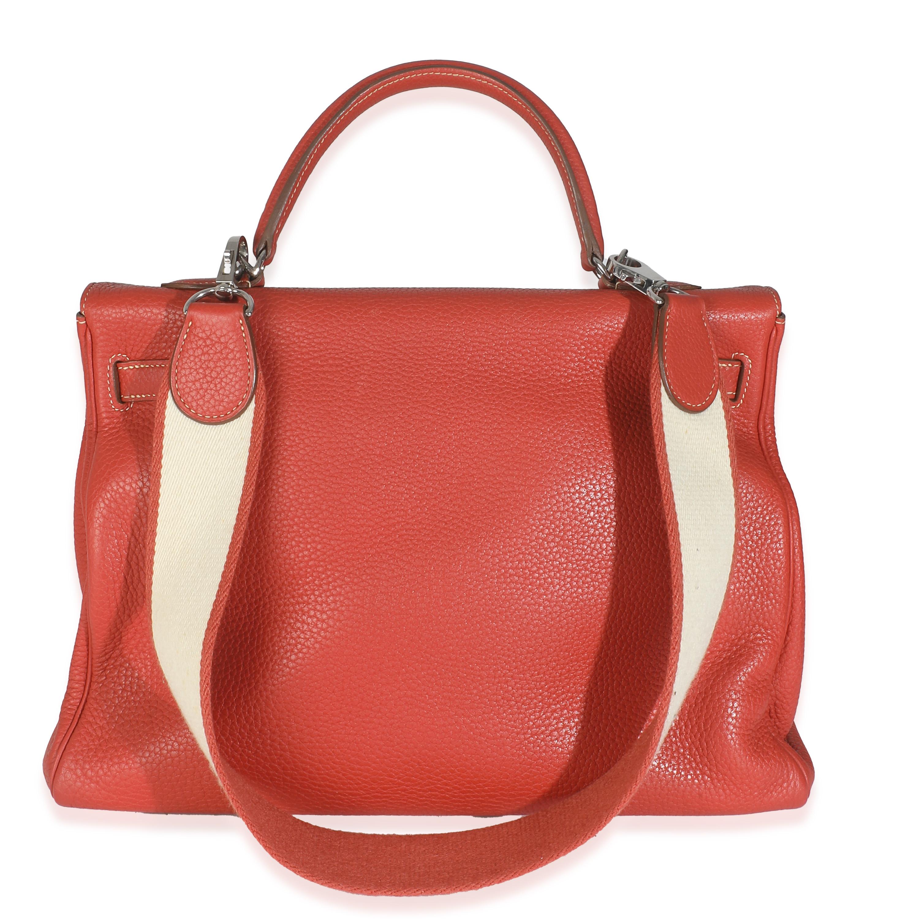 Listing Title: Hermès Sanguine Clemence Retourne Kelly 35 PHW
SKU: Z146484
Condition: Pre-owned 
Condition Description: Officially renamed in 1977, the Kelly tote bag from Hermès was originally called the Sac à Dépêches (which translates as ‘the