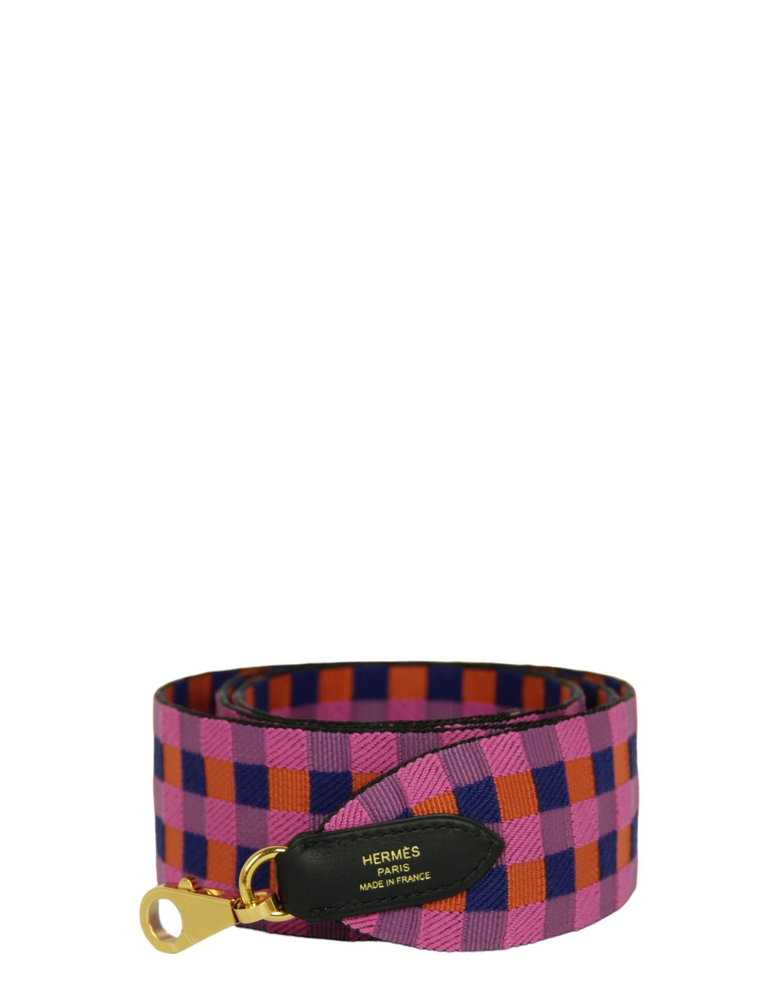 Hermes Saphir/Anemone/Capucine Toile Swift 50mm Maxi Quadrille Bag Shoulder Strap

Made In: France
Year of Production: 2022
Color:  Blue saphir, anemone purple, capucine orange
Hardware: Goldtone
Materials: Canvas, leather, metal
Closure/Opening:
