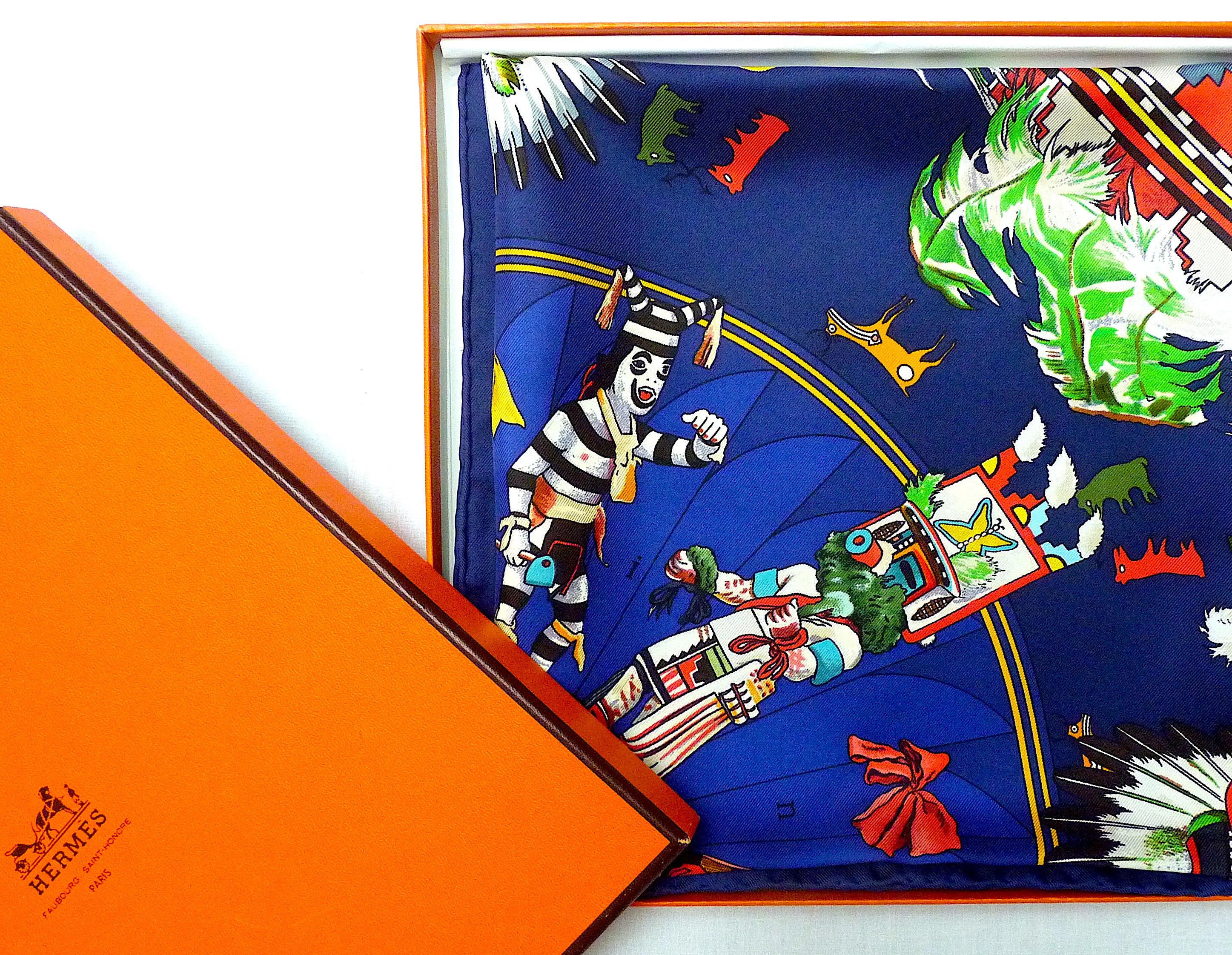 Ultra Rare Hermes Silk Scarf KACHINAS by KERMIT OLIVER, Pristine Condition with Hermes box ! Blue Background and Multicolore pattern

Kachinas by Kermit Oliver, the only American artist  ever to design for the Maison Hermes, first issued in