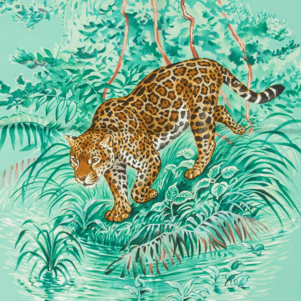 Mightychic offers an Hermes Equateur Wash Silk Twill scarf by Robert Dallet.  
Tropical Aqua, Emeraude and Fauve depicts equatorial animals, birds and plants.
This was silk has a velvety feel with a matte ever so slightly faded finish.
Incredibly
