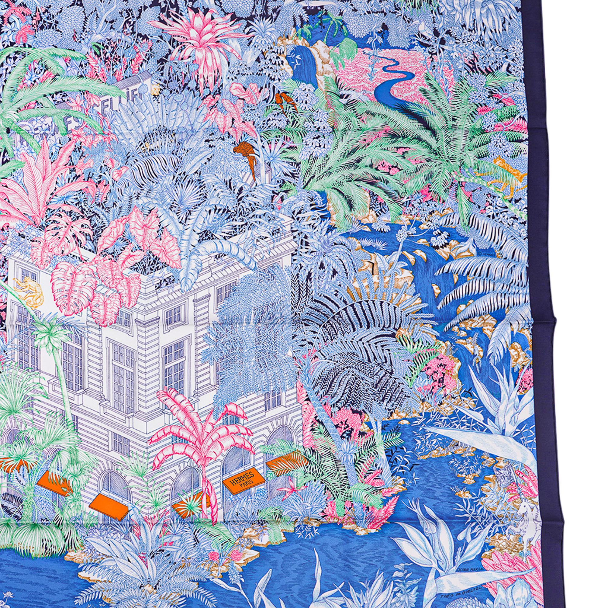 Mightychic offers a guaranteed authentic Hermes Faubourg Tropical scarf featured in Bleu Jean, Vert and Jaune.
Designed by Octave Marsal and Theo de Gueltzl.
This Hermes 90 silk scarf is set with a wonderful tropical jungle filled with marvelous