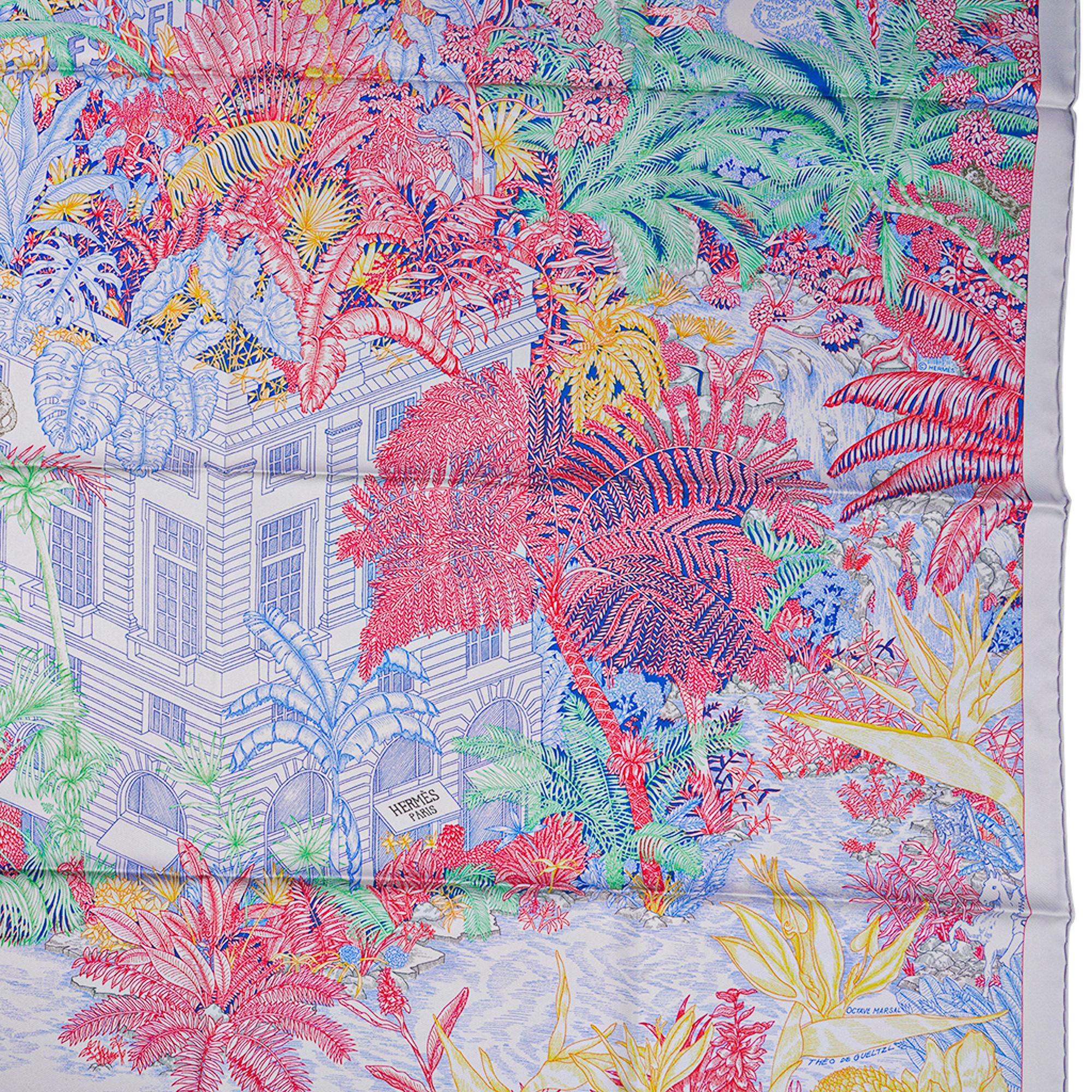 Mightychic offers a guaranteed authentic Hermes Faubourg Tropical scarf featured in Pierre ( Stone) and Rose.
Designed by Octave Marsal and Theo de Gueltzl.
This Hermes 90 silk scarf is set with a wonderful tropical jungle filled with marvelous