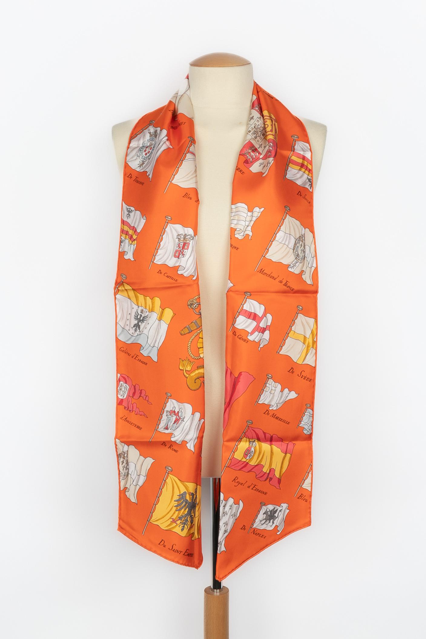 HERMÈS - (Made in France) Orange silk twill swarf illustrated with the 
