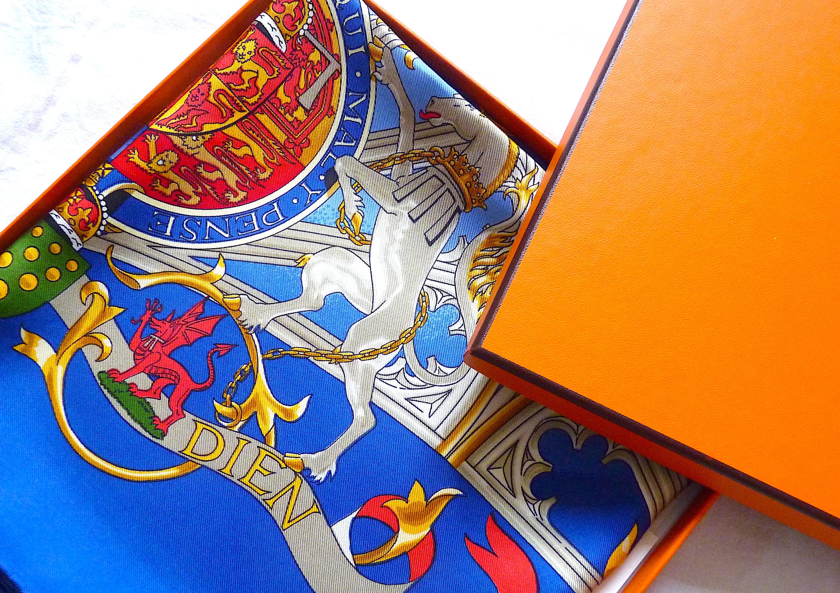 Ich Dien is a very famous Hermès Scarf ! It is a Special Edition of British Heraldry designed by V. Rybaltchenko in 1969, and printed to celebrate Lady Diana and Prince Charles's Wedding in July 1981.

Very sought after among Hermes collectors, this