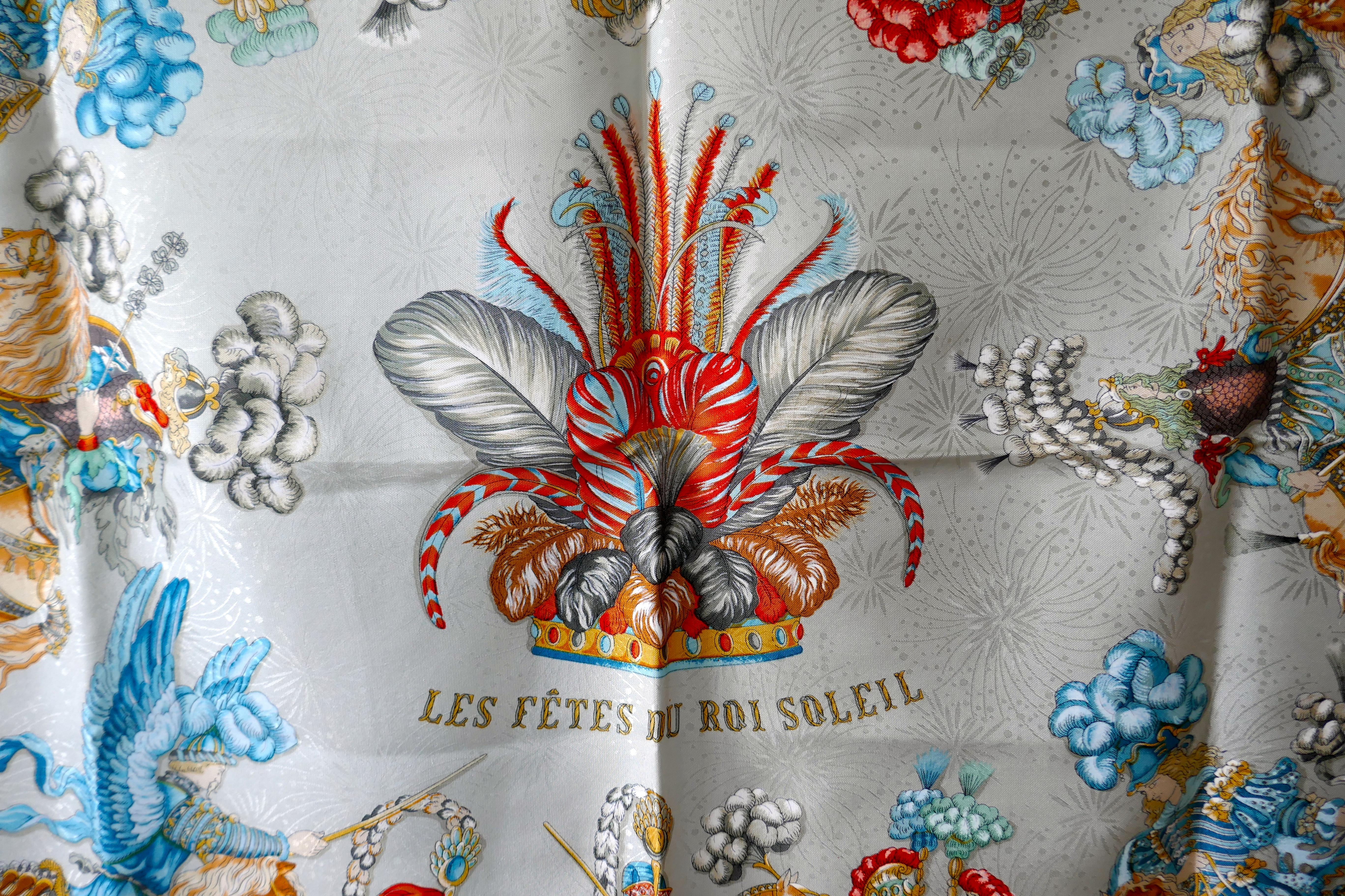 Hermès Scarf, in 100% Silk, Michel Duchene design “Les Fetes du Roi Soleil” 

In unworn good condition,  
Logo and HERMÈs-Paris
The scarf is bright with finely detailed Horse Pictures
The Scarf is 34” x 34” 
100% Silk with hand rolled hems

F48
