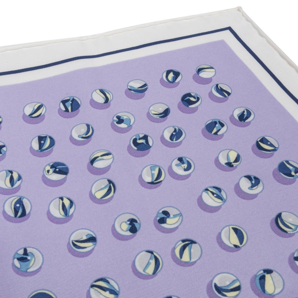 Guaranteed authentic Hermes Jeu De Billes 45 silk scarf. 
Features playful ball game in Blanc, Marine and Mauve.
Designed by Dimitri Rybaltchenko.
NEW or NEVER WORN
final sale

SCARF MEASURES:
18